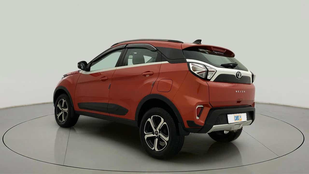 Rear three-quarter view of a Flame Red Tata Nexon 2017-2023