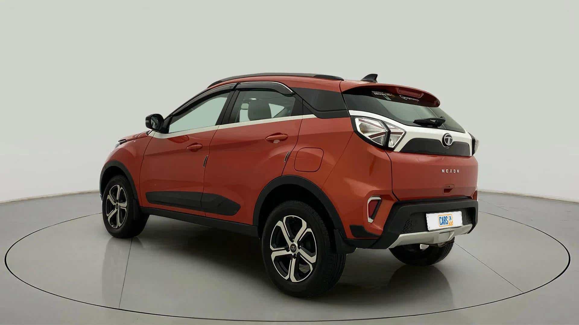 Rear three-quarter view of a Flame Red Tata Nexon 2017-2023