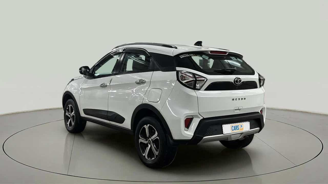 Rear three-quarter view of a Calgary White Tata Nexon 2017-2023