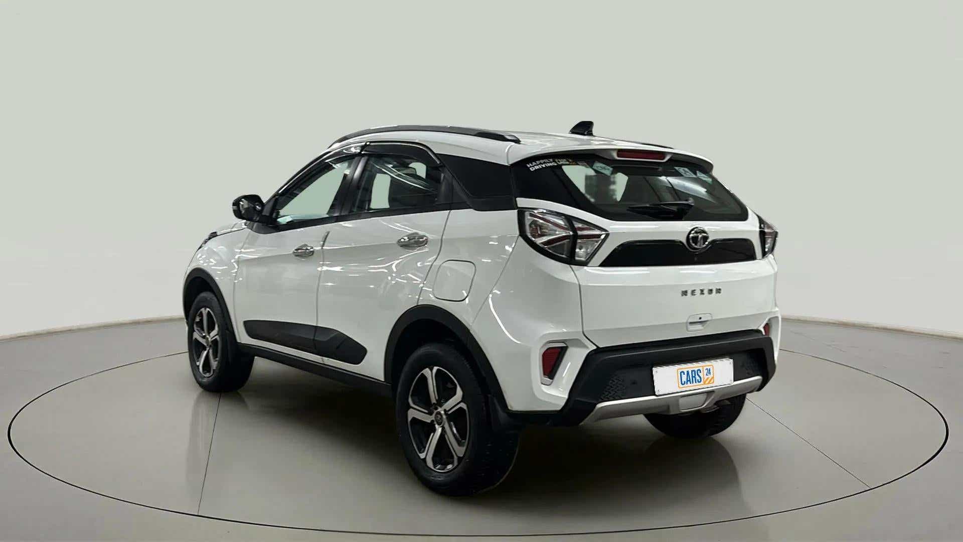 Rear three-quarter view of a Calgary White Tata Nexon 2017-2023