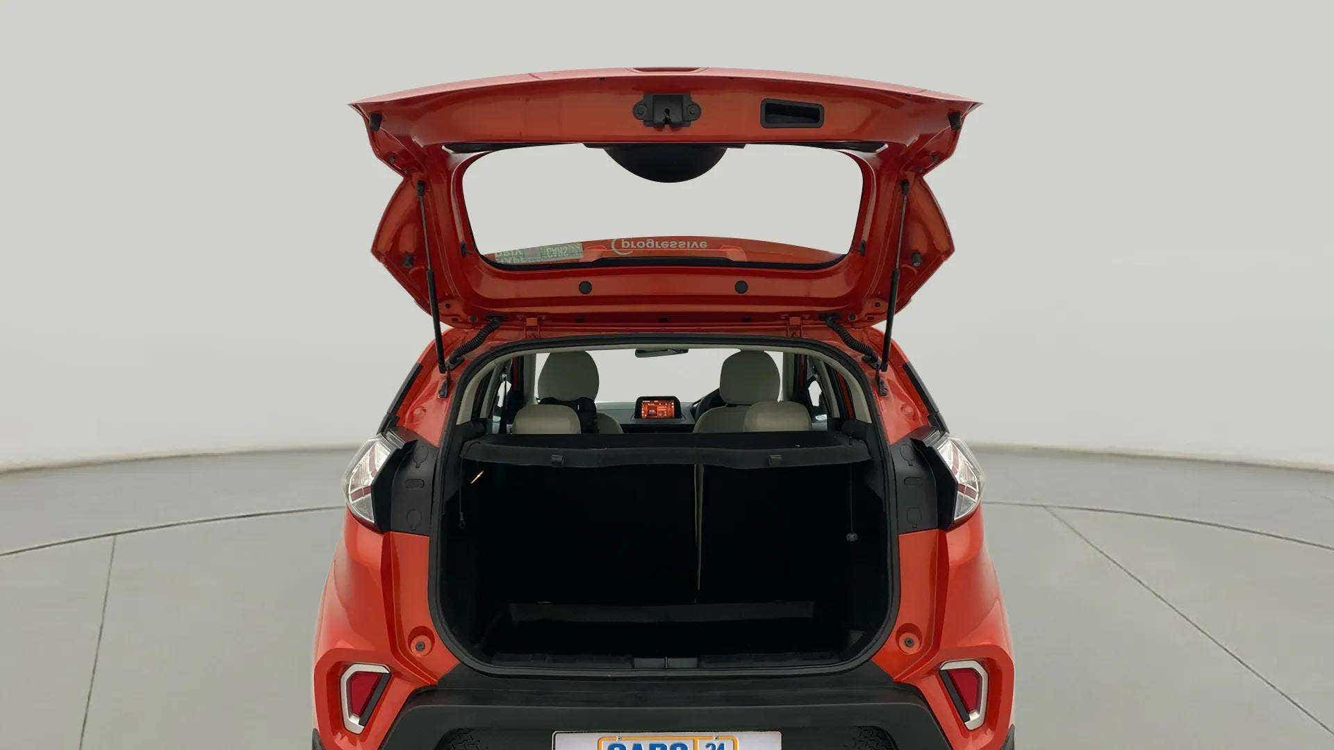 Open boot view of a Flame Red Tata Nexon 2017-2023