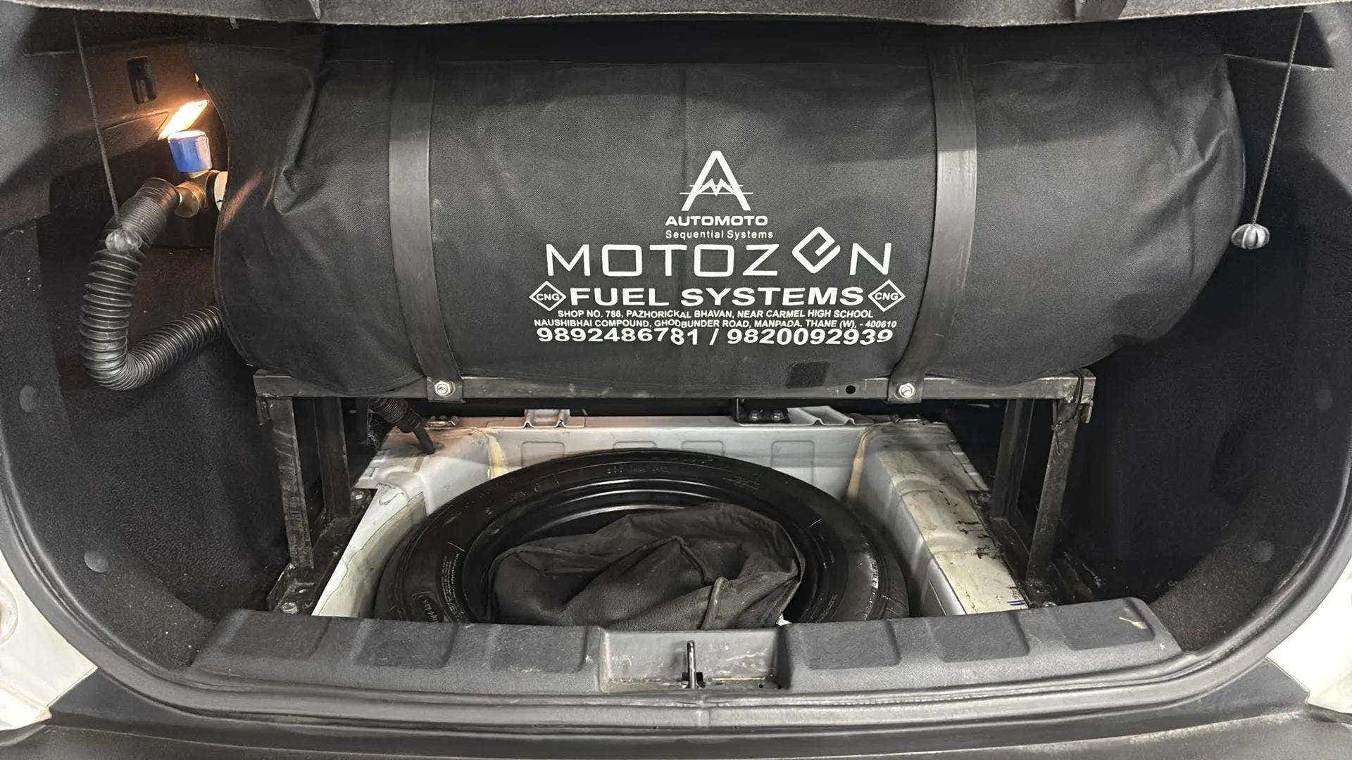 Cng cylinder and spare wheel in a Tata Nexon 2017-2023 boot