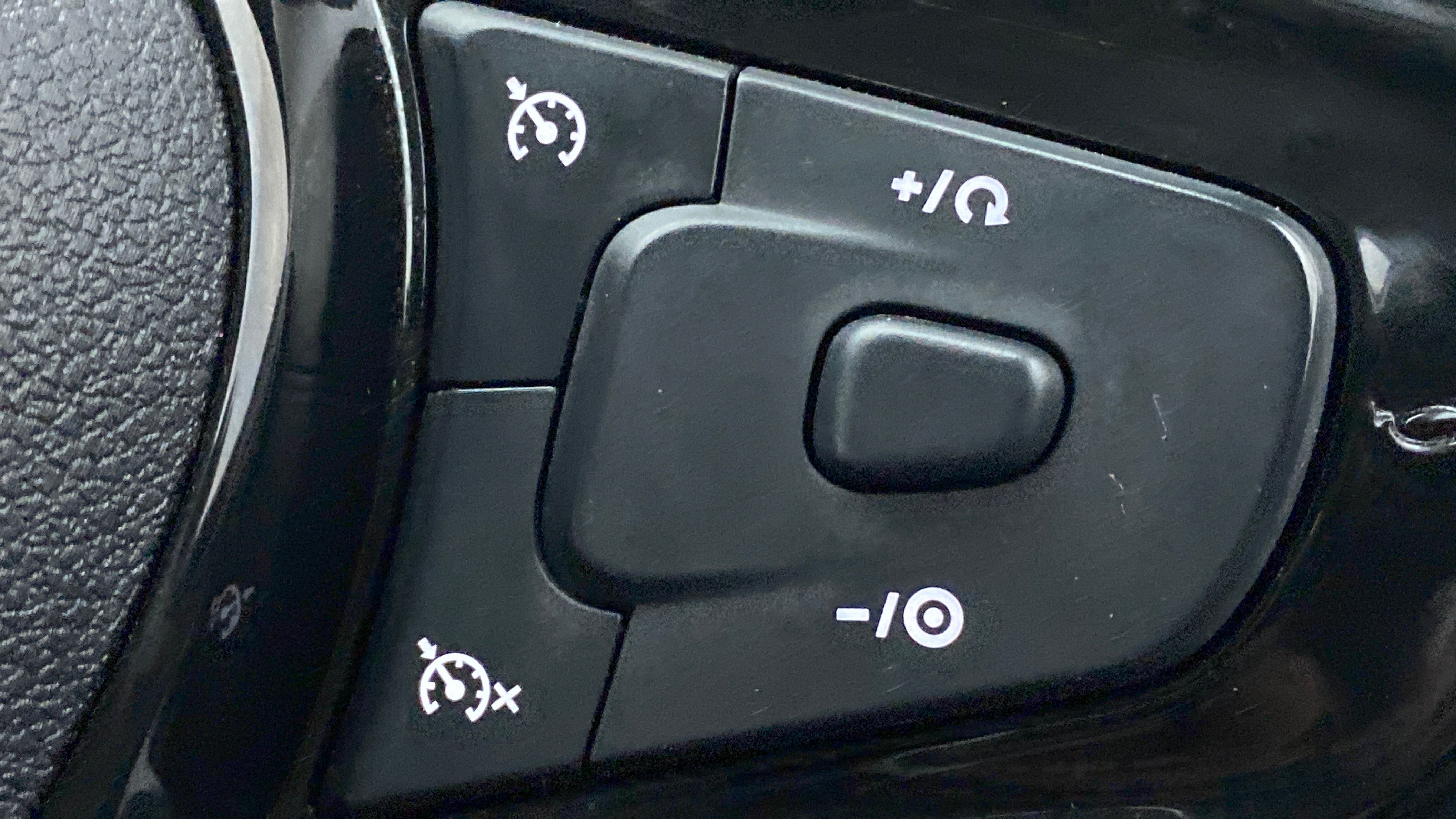 Steering wheel cruise control buttons of a Tata Nexon 2017-2023
