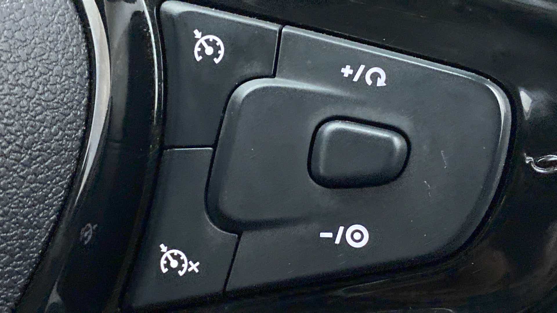 Steering wheel cruise control buttons of a Tata Nexon 2017-2023