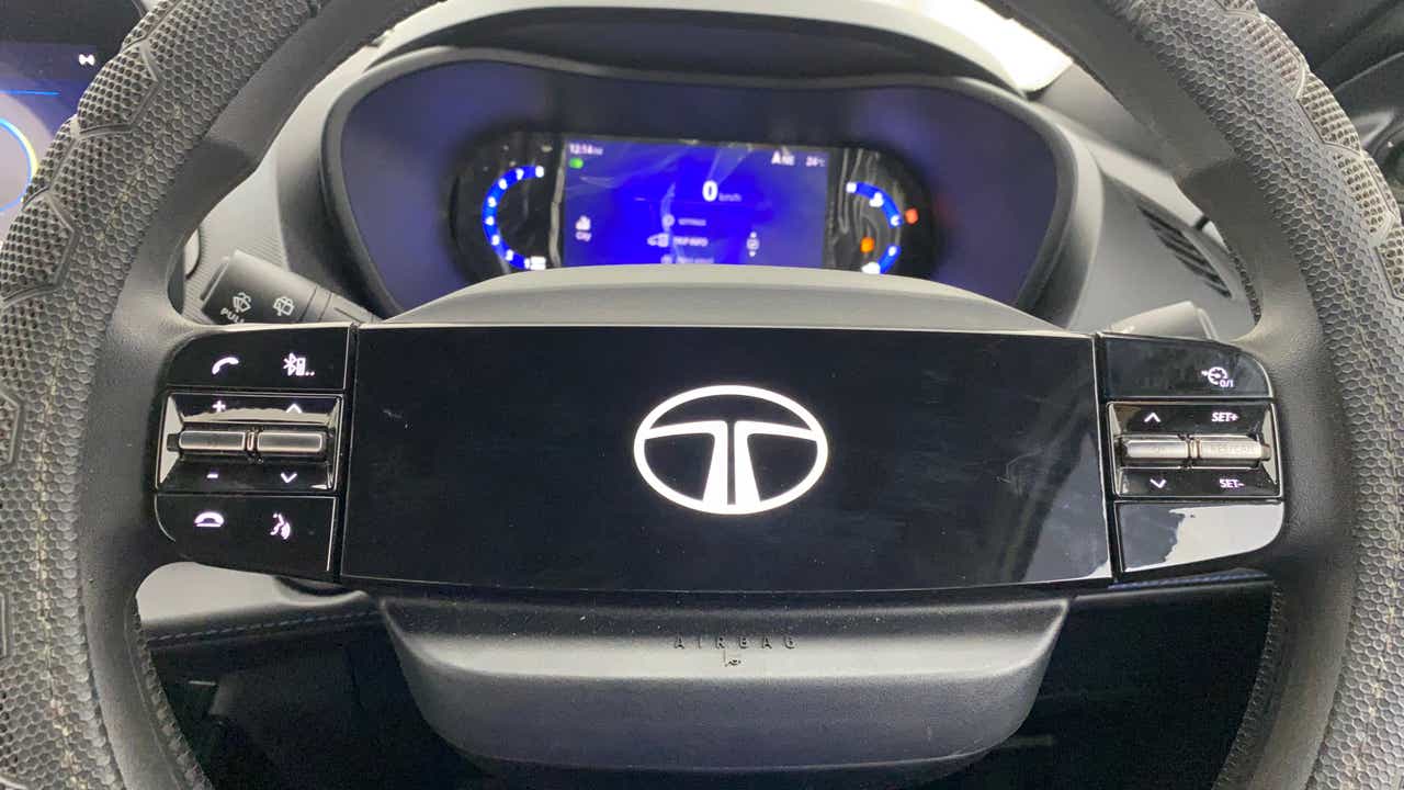 Steering wheel and instrument cluster of a Tata Nexon