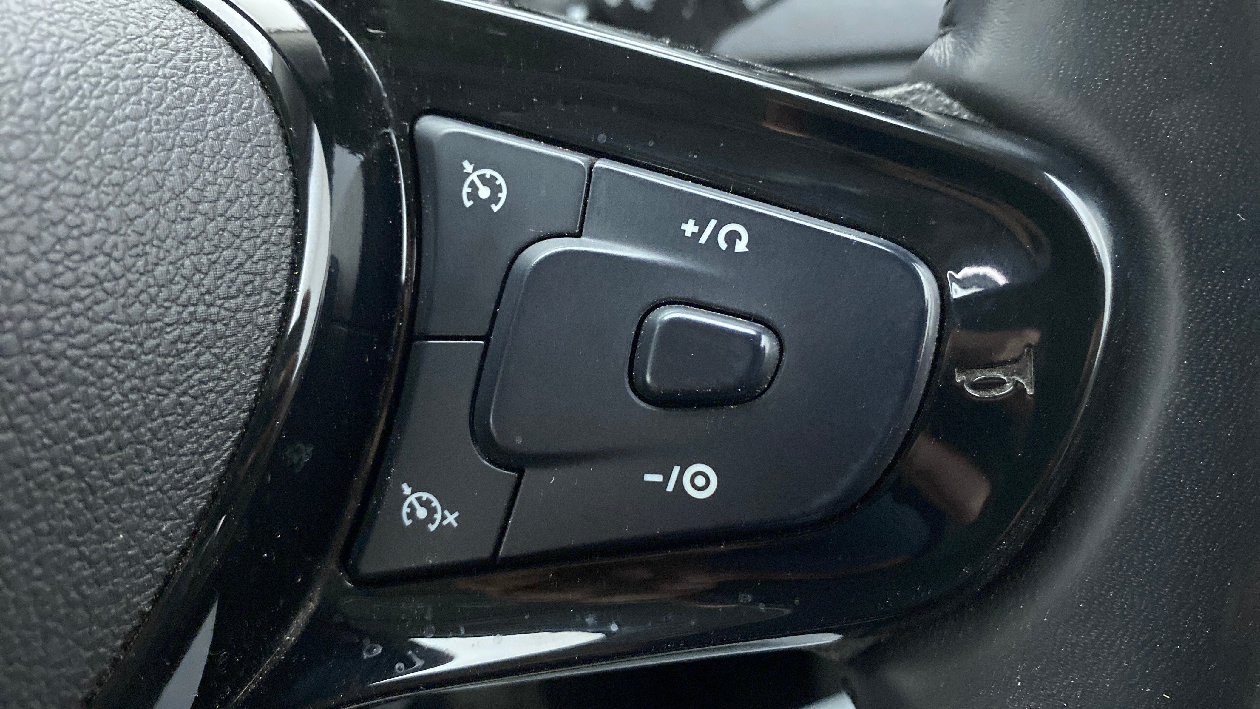 Steering wheel cruise control buttons of a Tata Nexon 2017-2023