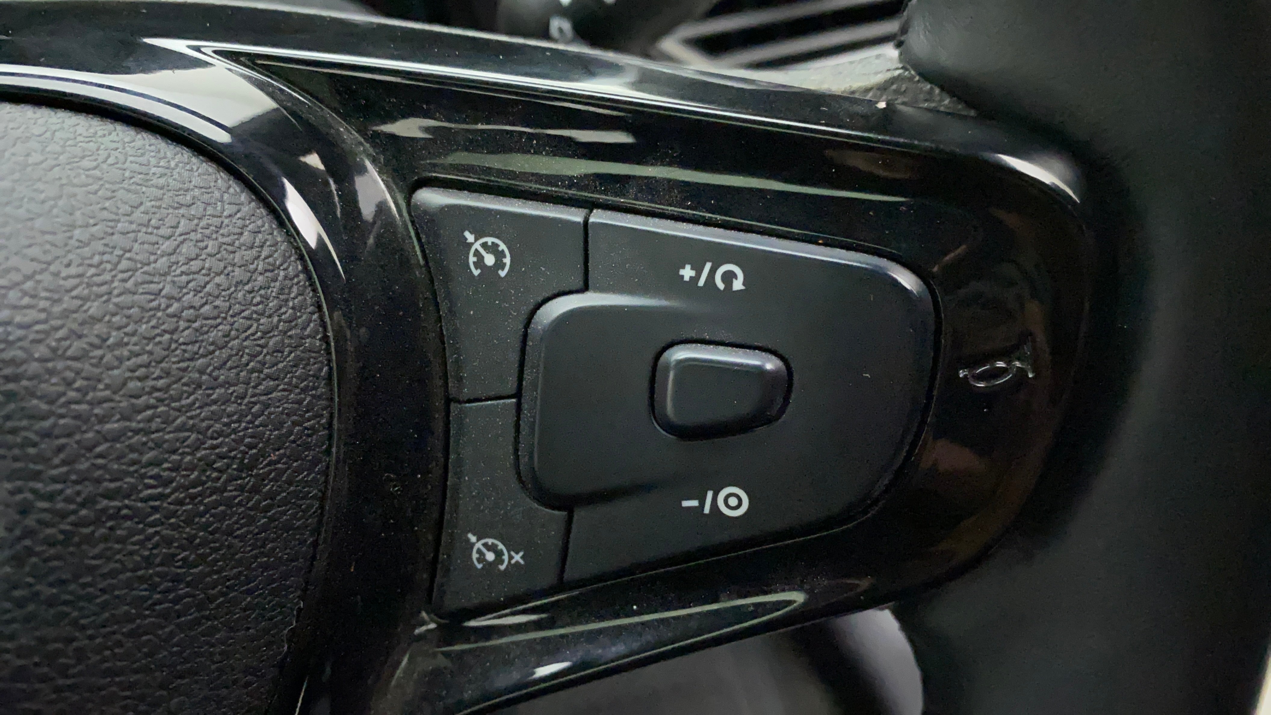 Steering wheel cruise control buttons of a Tata Nexon 2017-2023