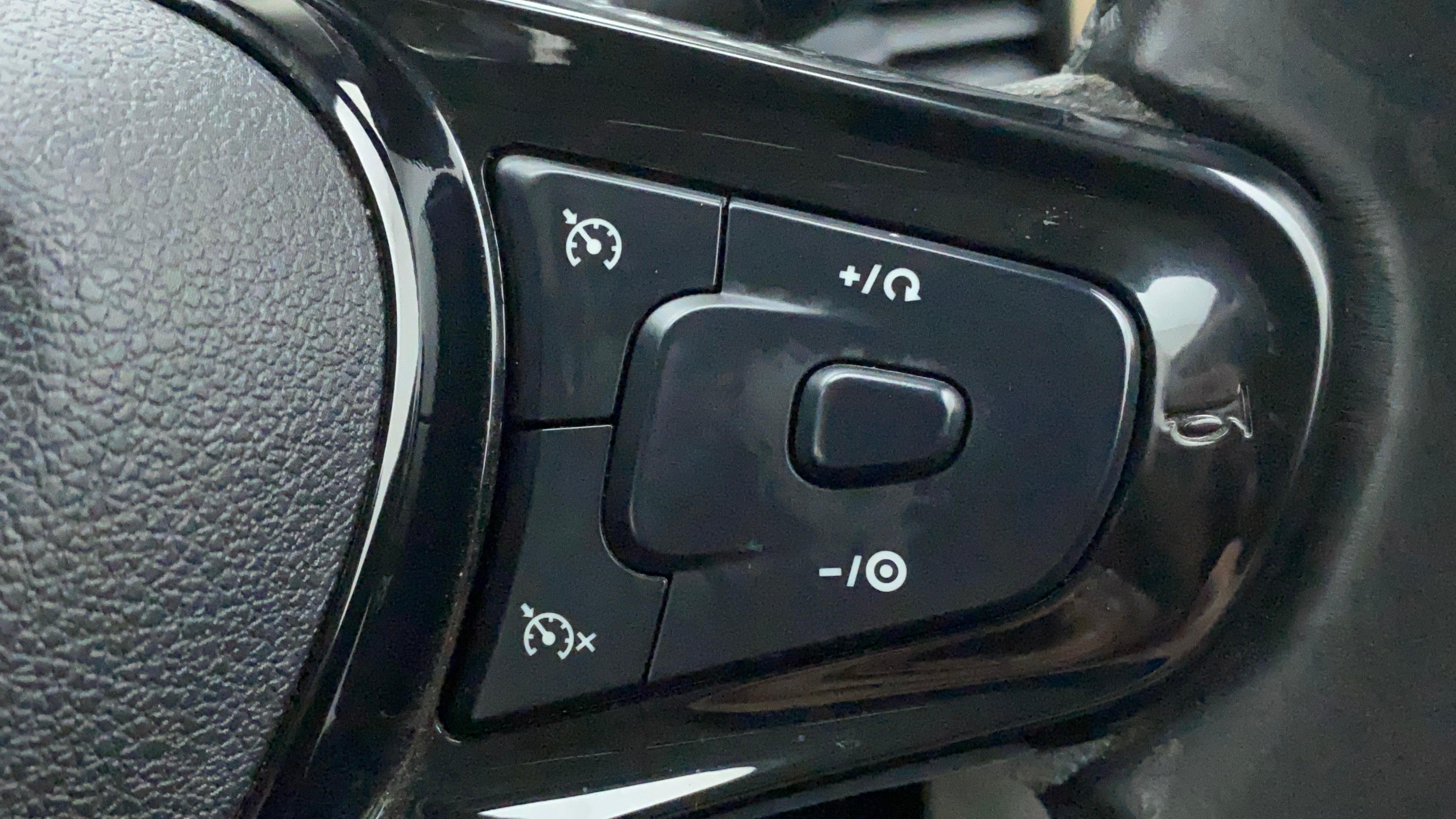 Steering wheel cruise control buttons of a Tata Nexon 2017-2023