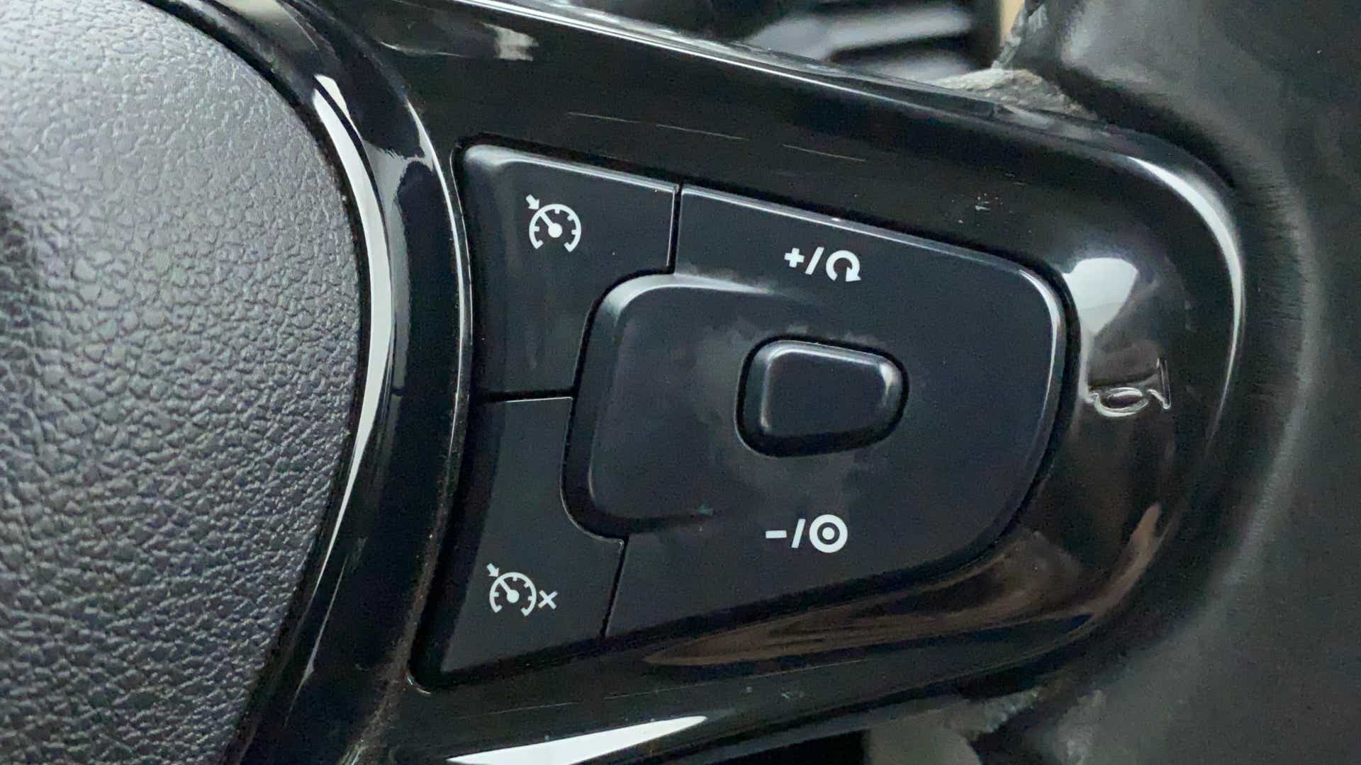 Steering wheel cruise control buttons of a Tata Nexon 2017-2023