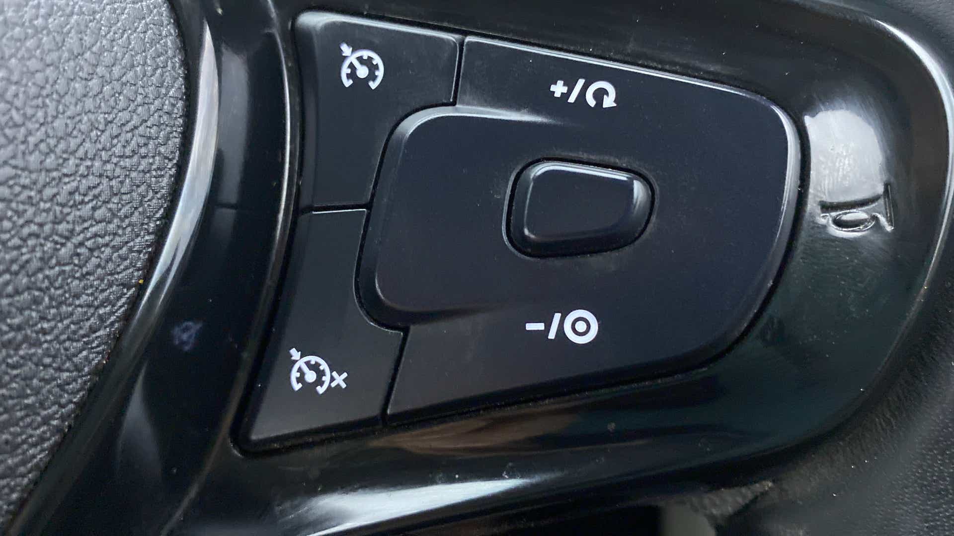 Steering wheel cruise control buttons of a Tata Nexon 2017-2023