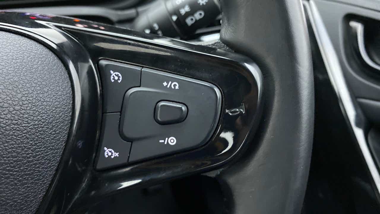 Steering wheel cruise control buttons of a Tata Nexon 2017-2023