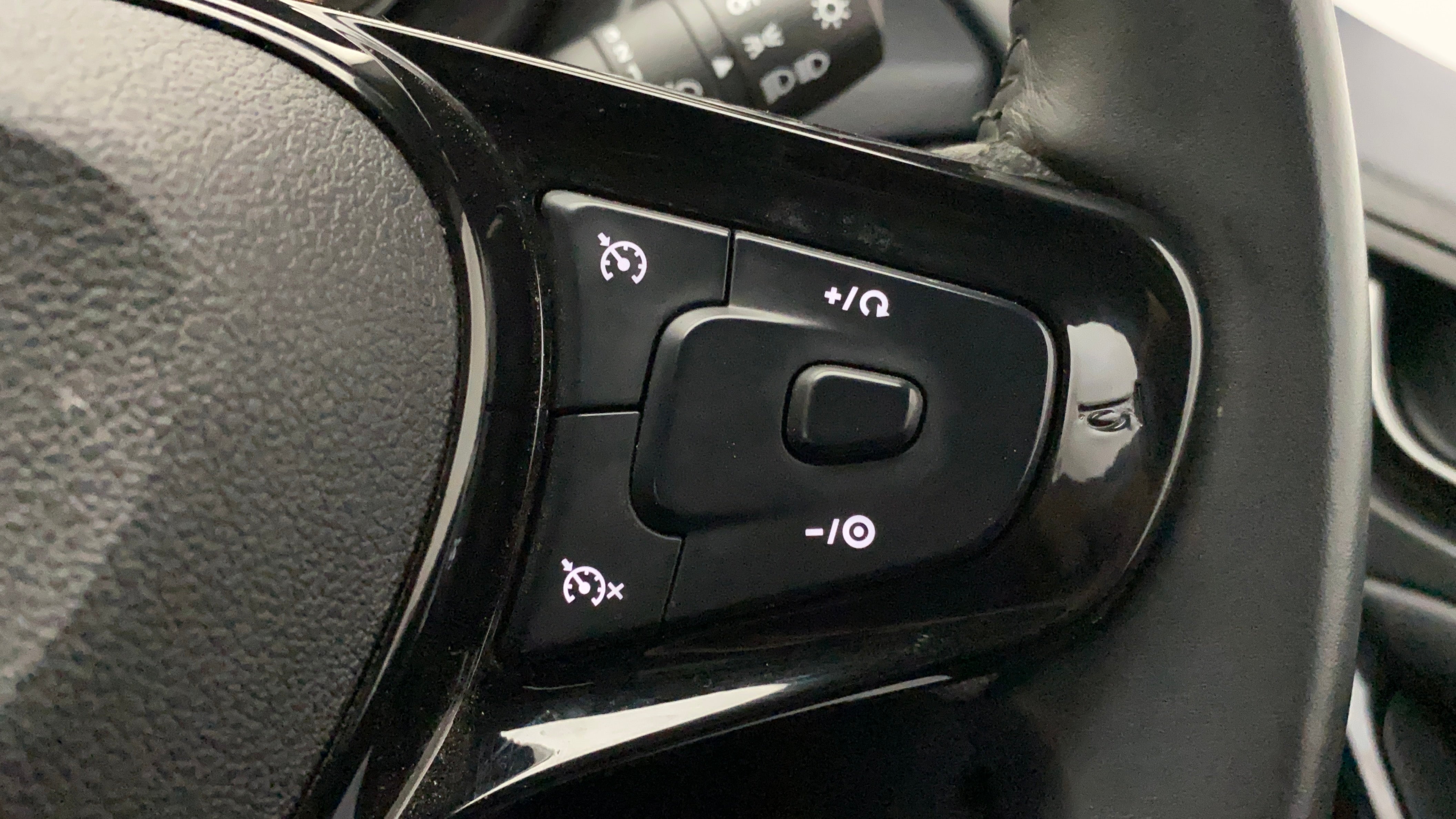 Steering wheel cruise control buttons of a Tata Nexon 2017-2023