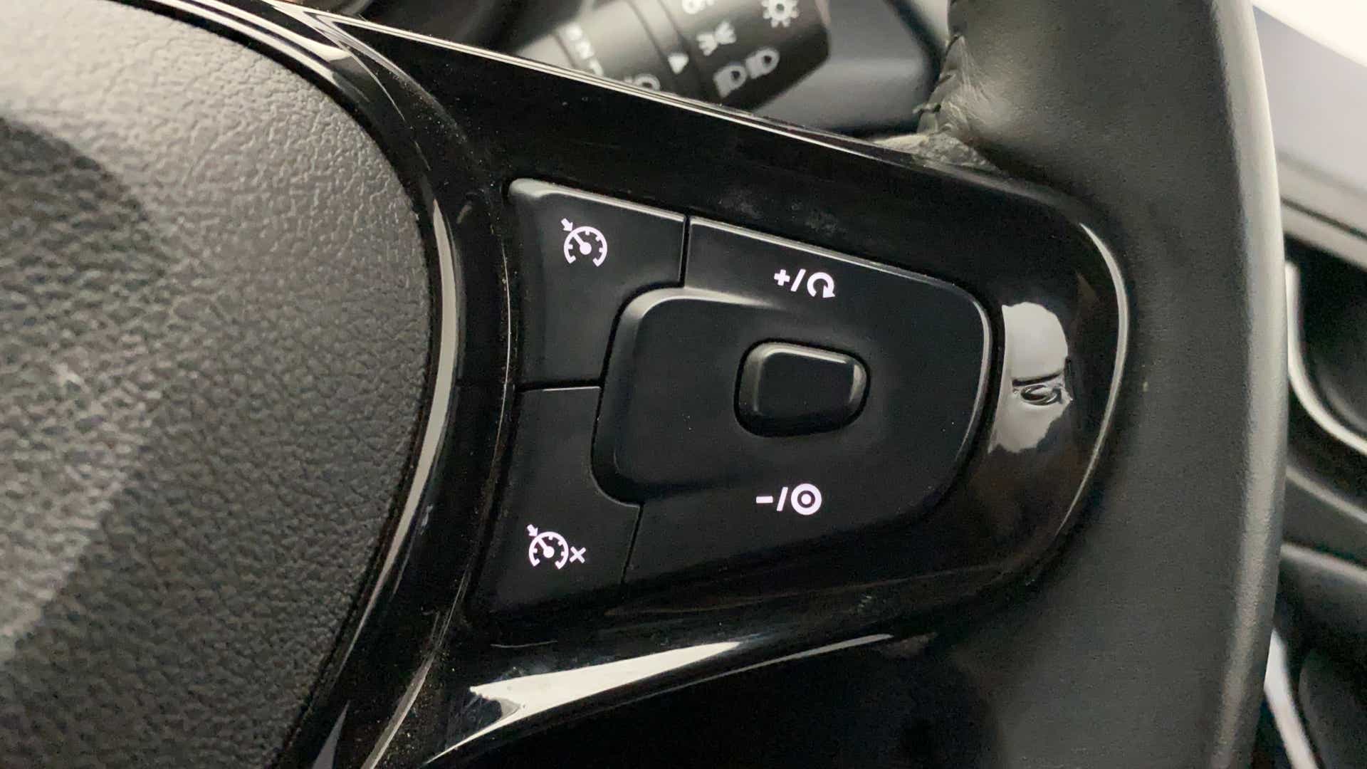 Steering wheel cruise control buttons of a Tata Nexon 2017-2023