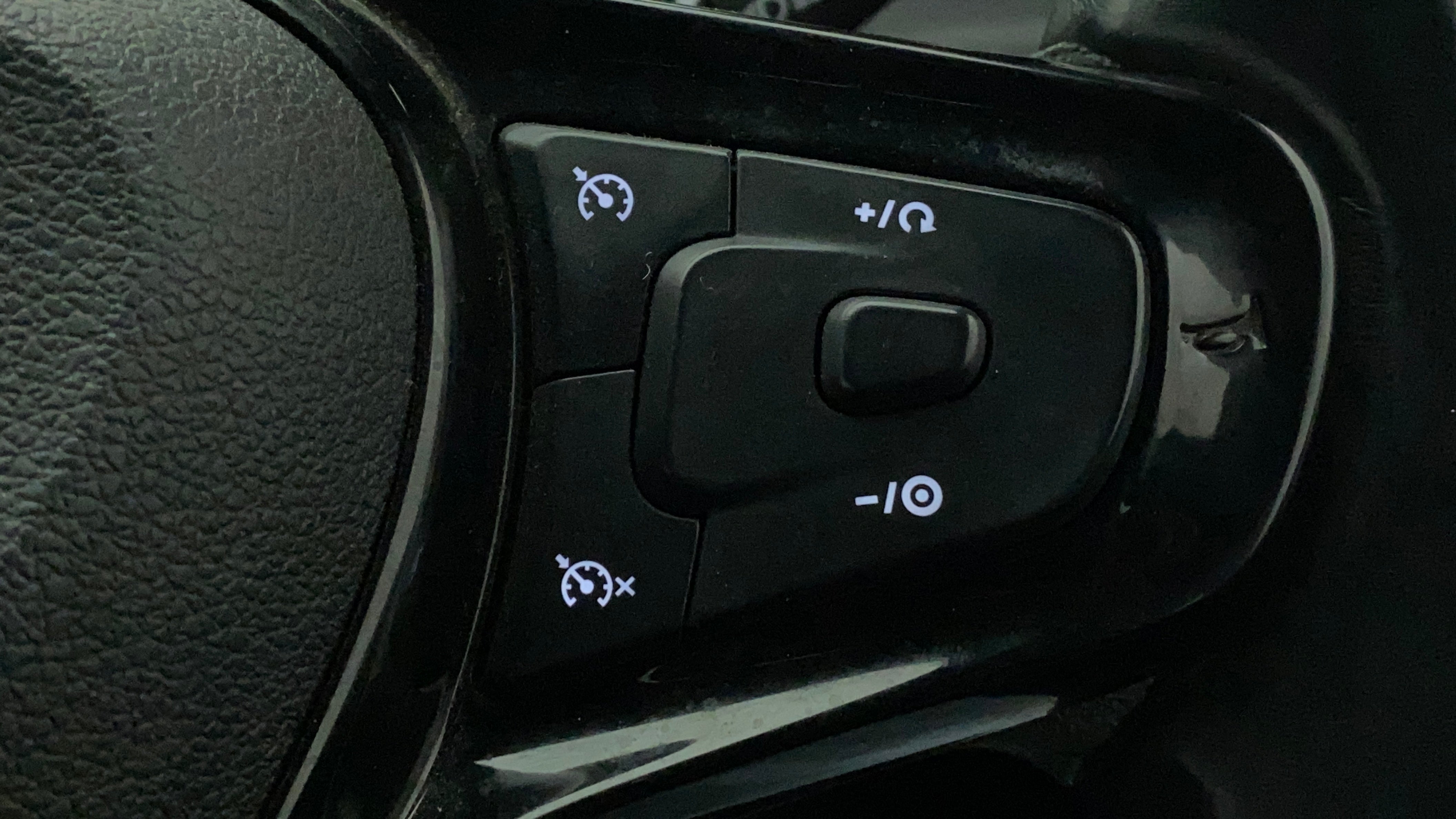 Steering wheel cruise control buttons of a Tata Nexon 2017-2023