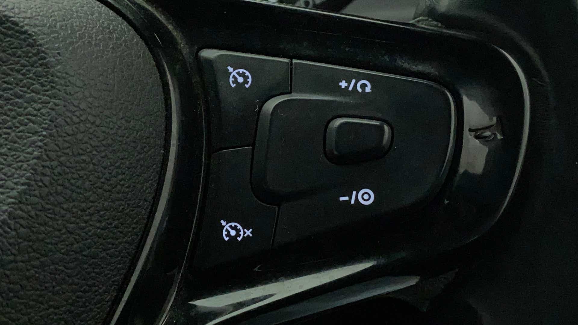 Steering wheel cruise control buttons of a Tata Nexon 2017-2023