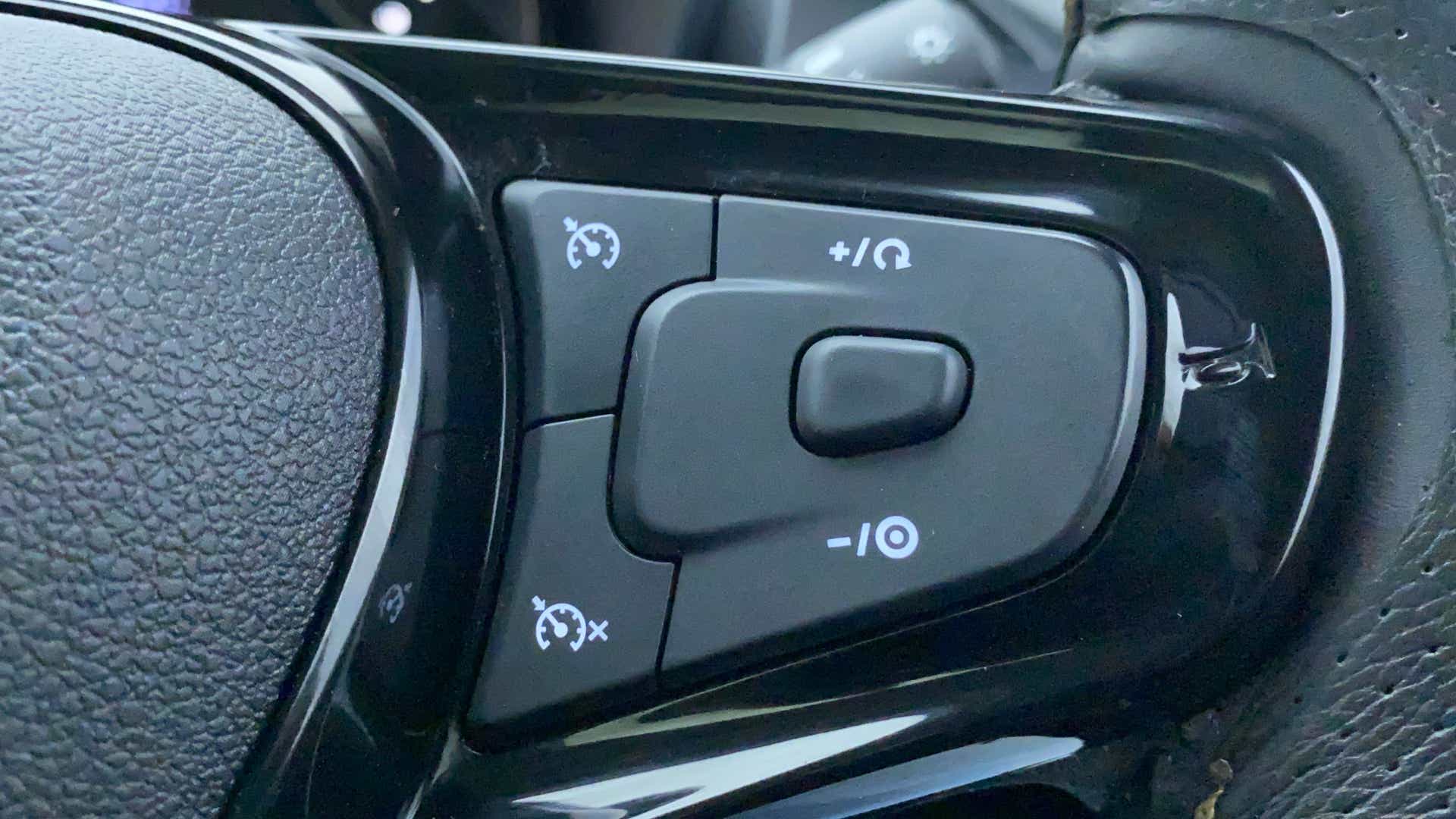 Steering wheel cruise control buttons of a Tata Nexon 2017-2023