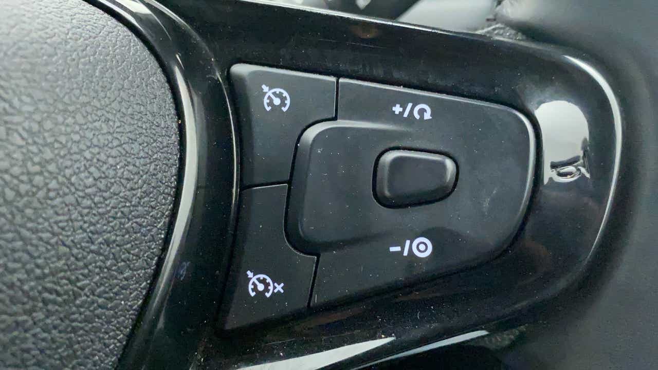 Steering wheel cruise control button cluster of a Tata Nexon 2017-2023