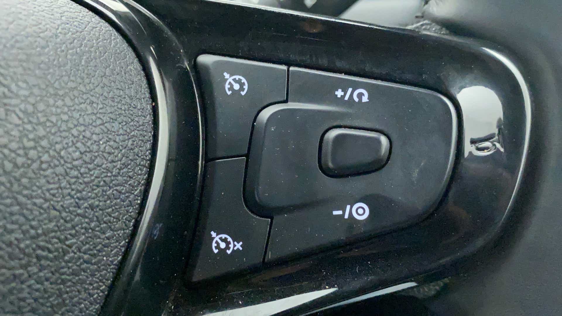 Steering wheel cruise control button cluster of a Tata Nexon 2017-2023