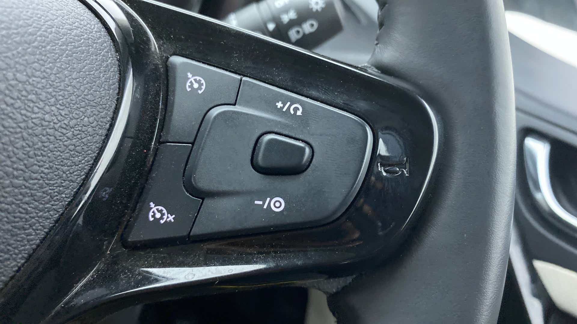 Steering wheel cruise control buttons of a Tata Nexon 2017-2023