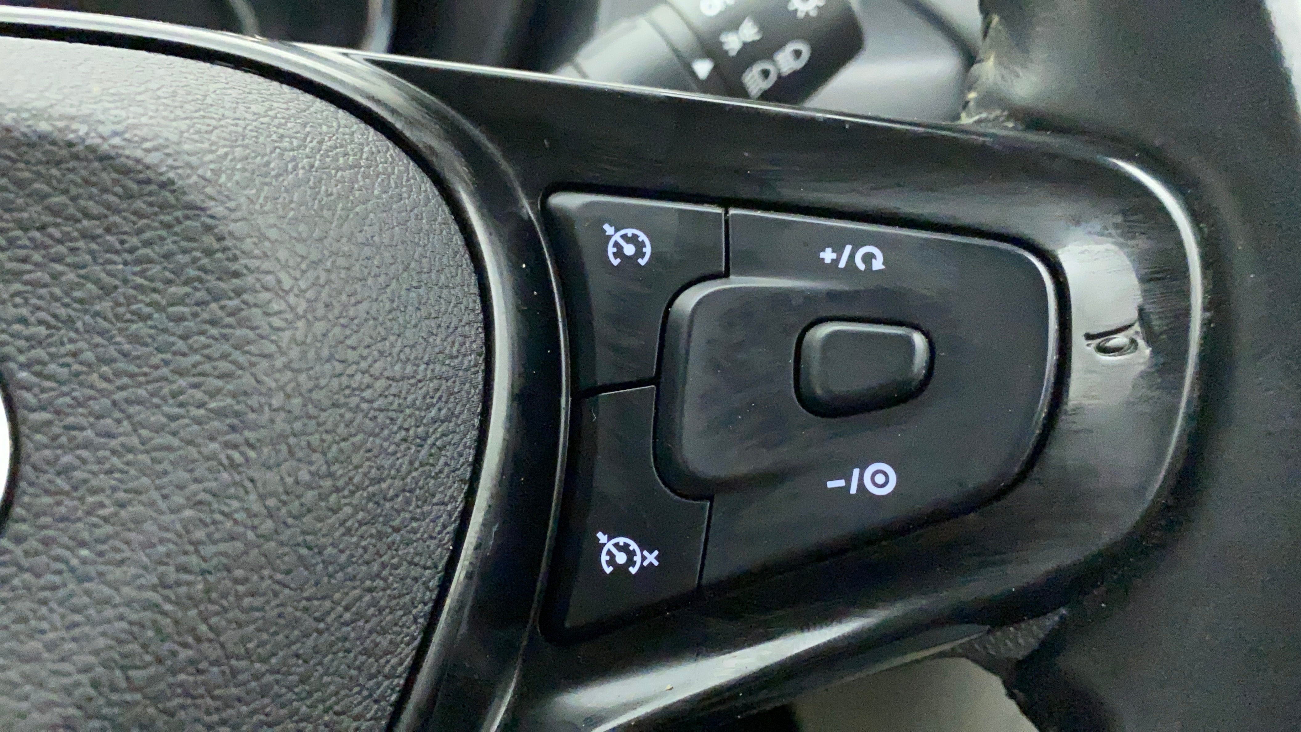 Steering wheel cruise control buttons of a Tata Nexon 2017-2023
