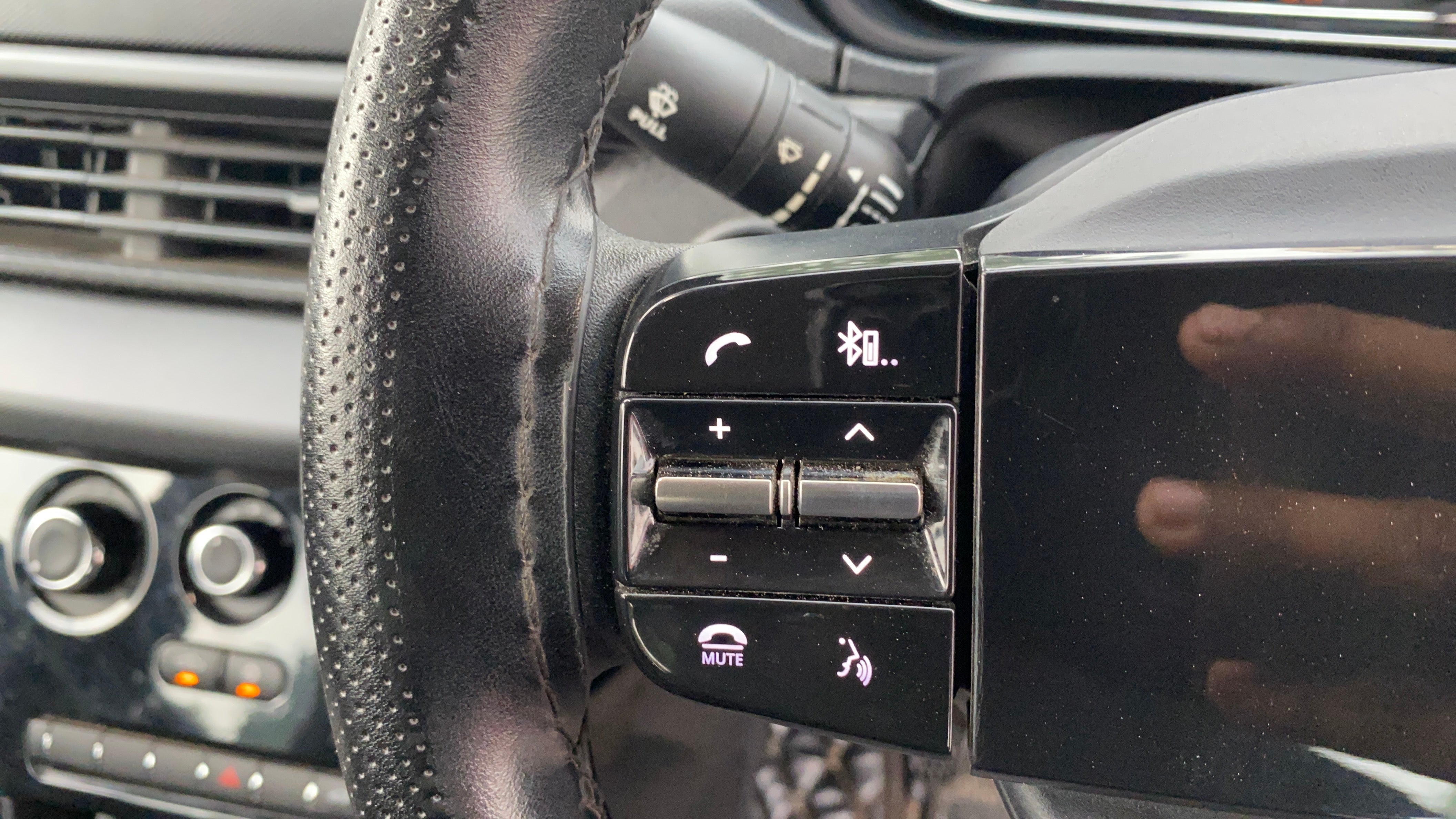 Steering wheel control buttons of a Tata Nexon