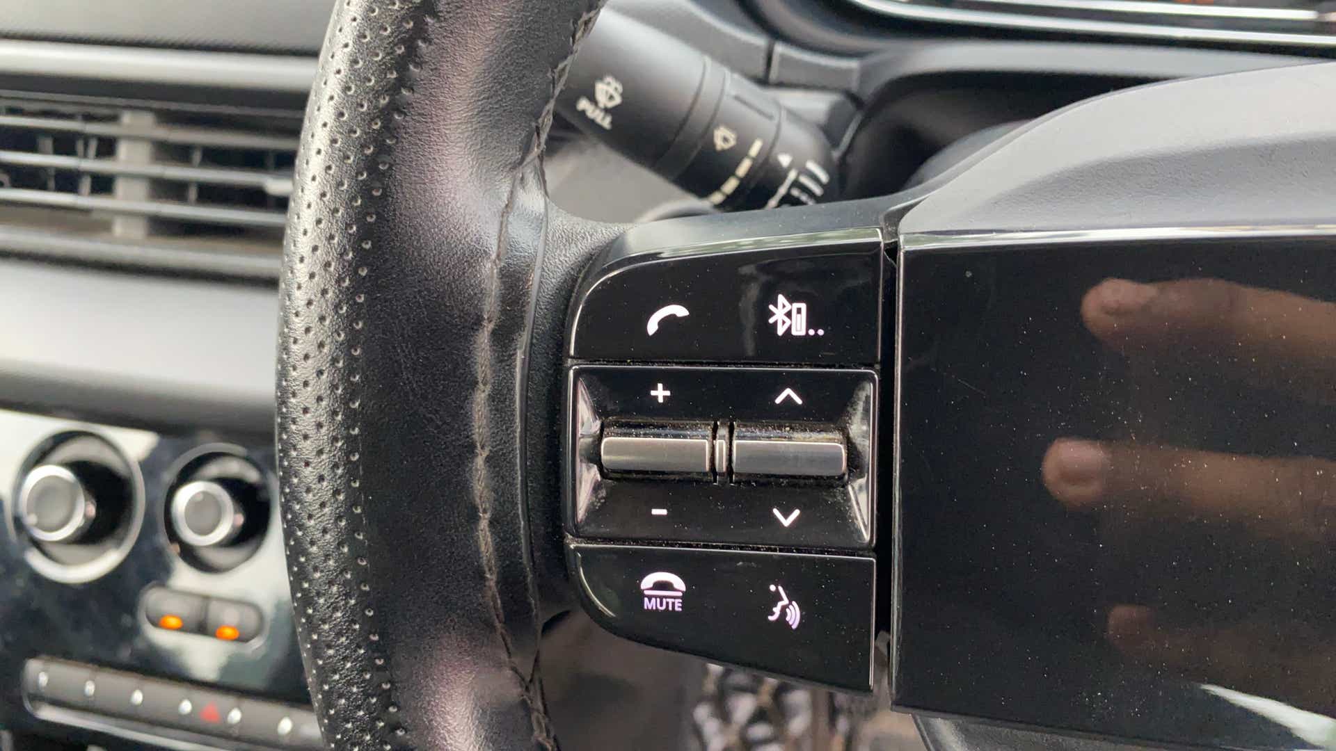 Steering wheel control buttons of a Tata Nexon