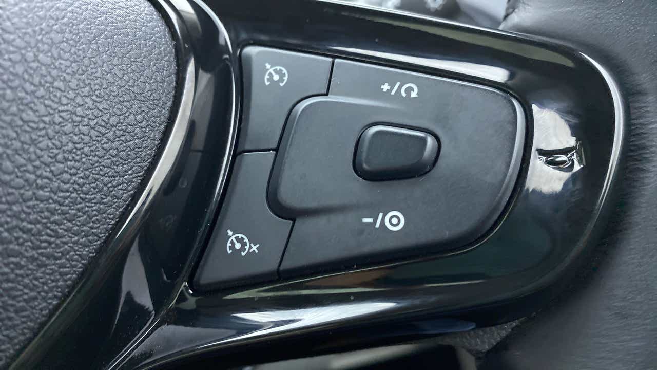 Steering wheel cruise control buttons of a Tata Nexon 2017-2023