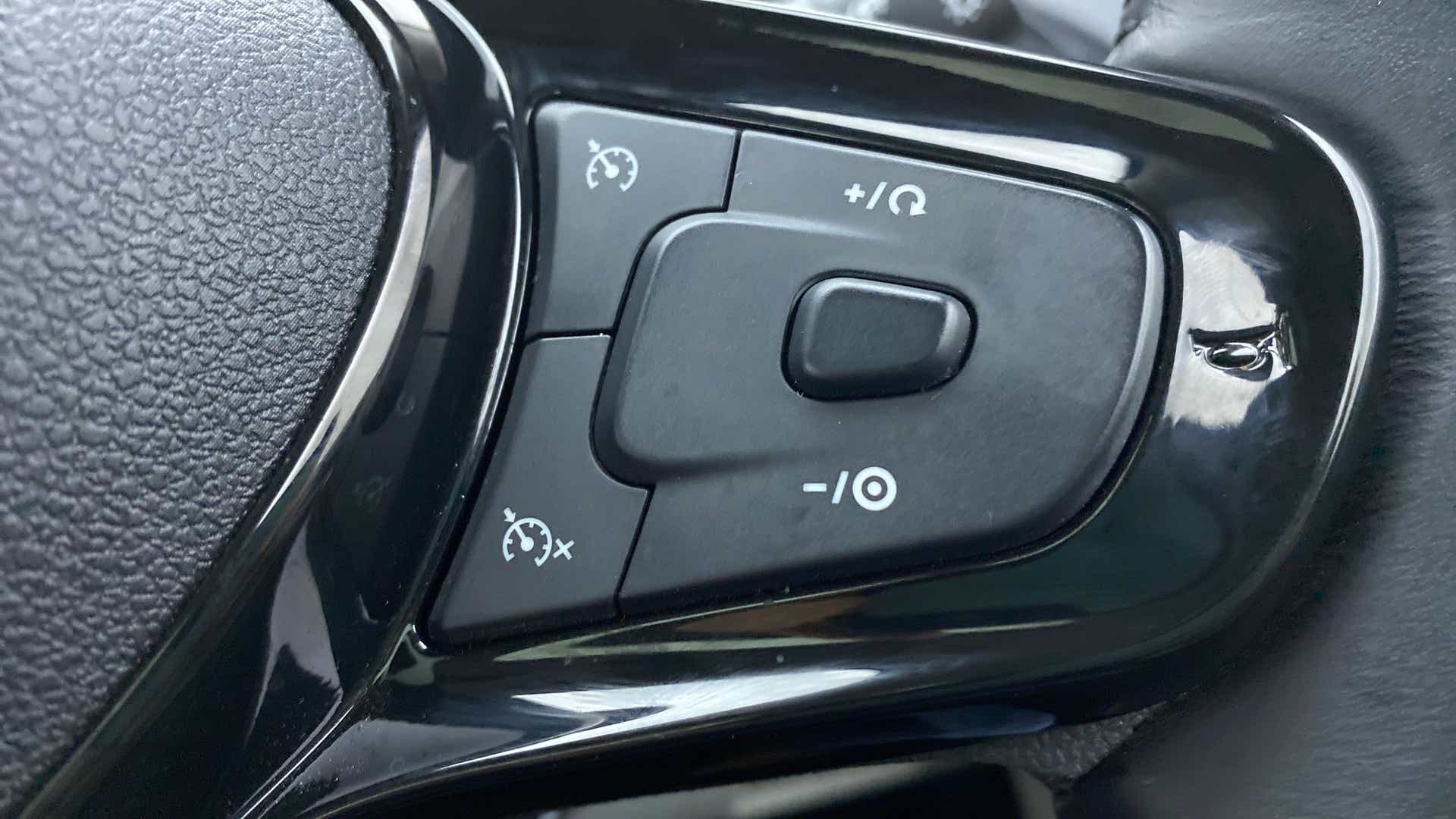 Steering wheel cruise control buttons of a Tata Nexon 2017-2023