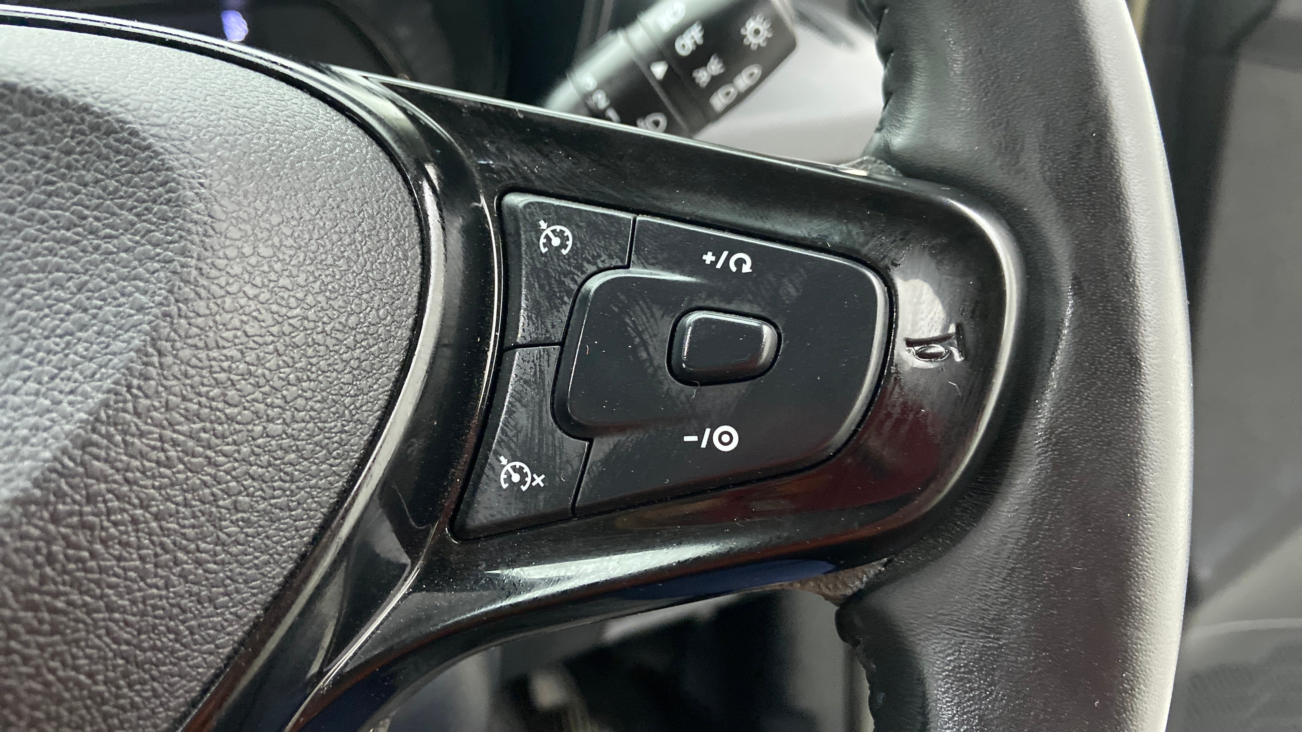 Steering wheel cruise control buttons of a Tata Nexon 2017-2023