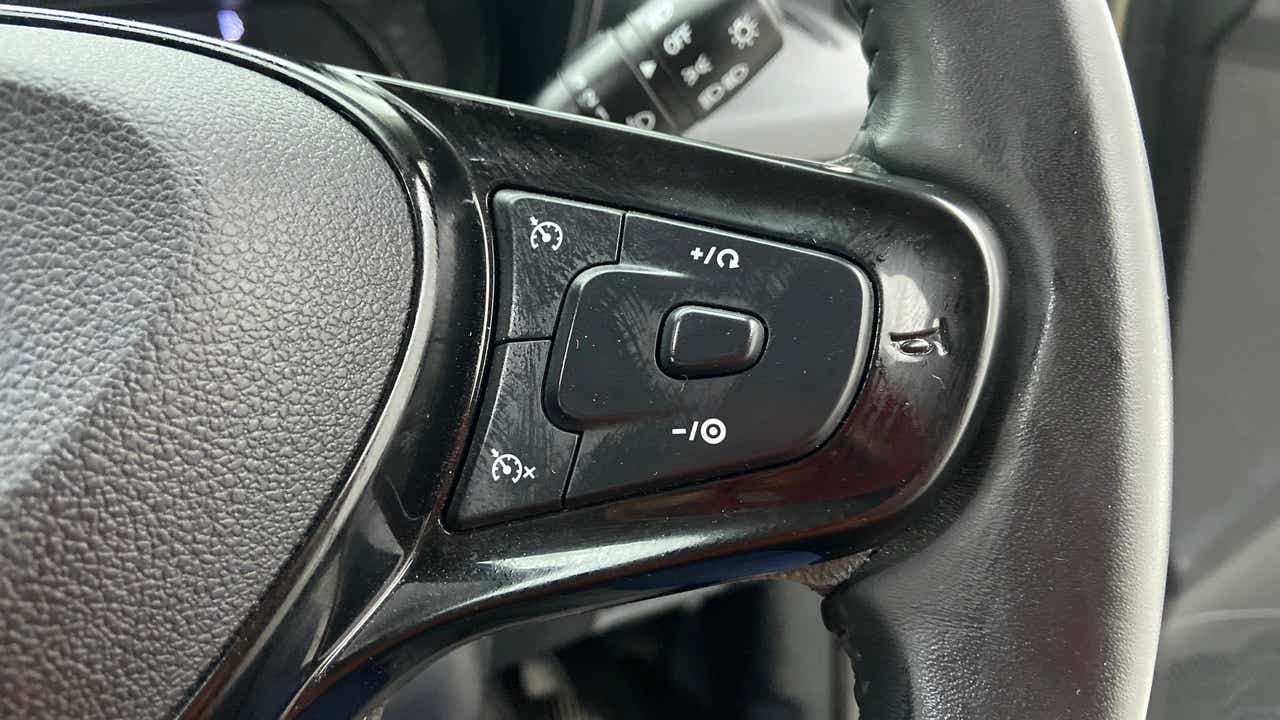 Steering wheel cruise control buttons of a Tata Nexon 2017-2023