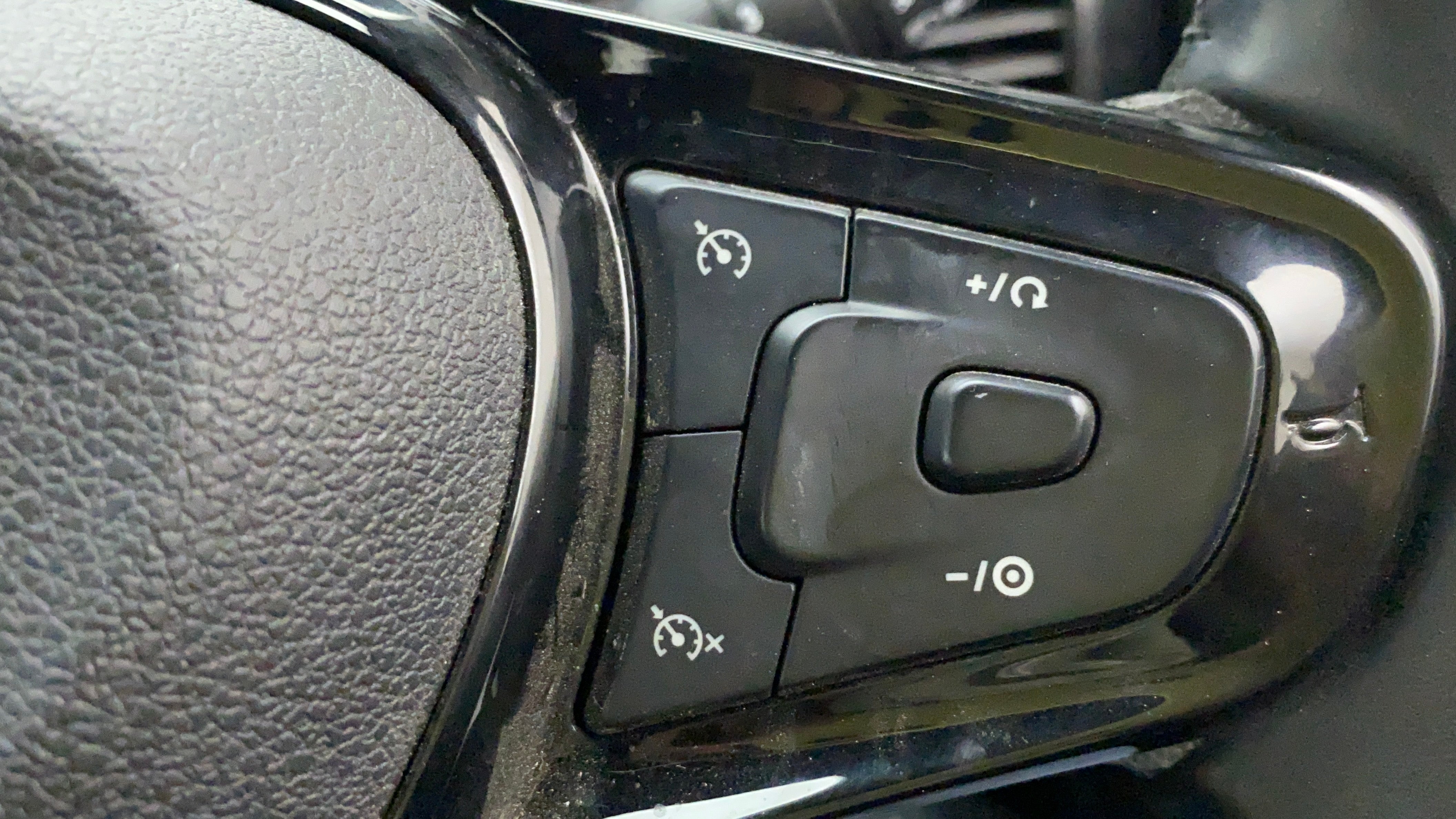 Steering wheel cruise control buttons of a Tata Nexon 2017-2023