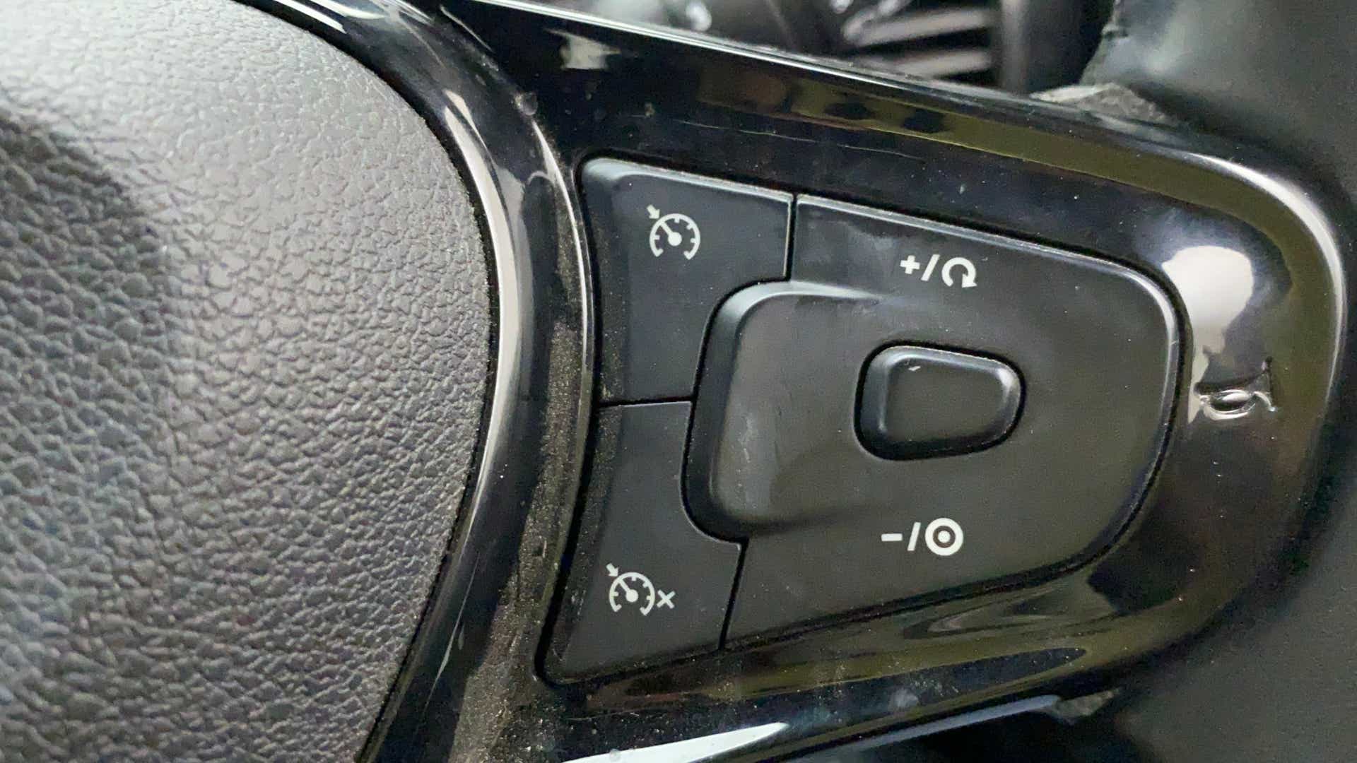 Steering wheel cruise control buttons of a Tata Nexon 2017-2023