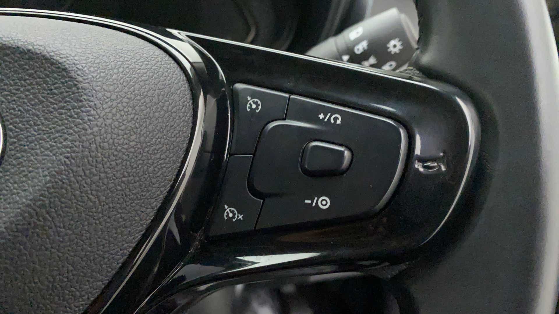 Steering wheel button controls of a Tata Nexon 2017-2023