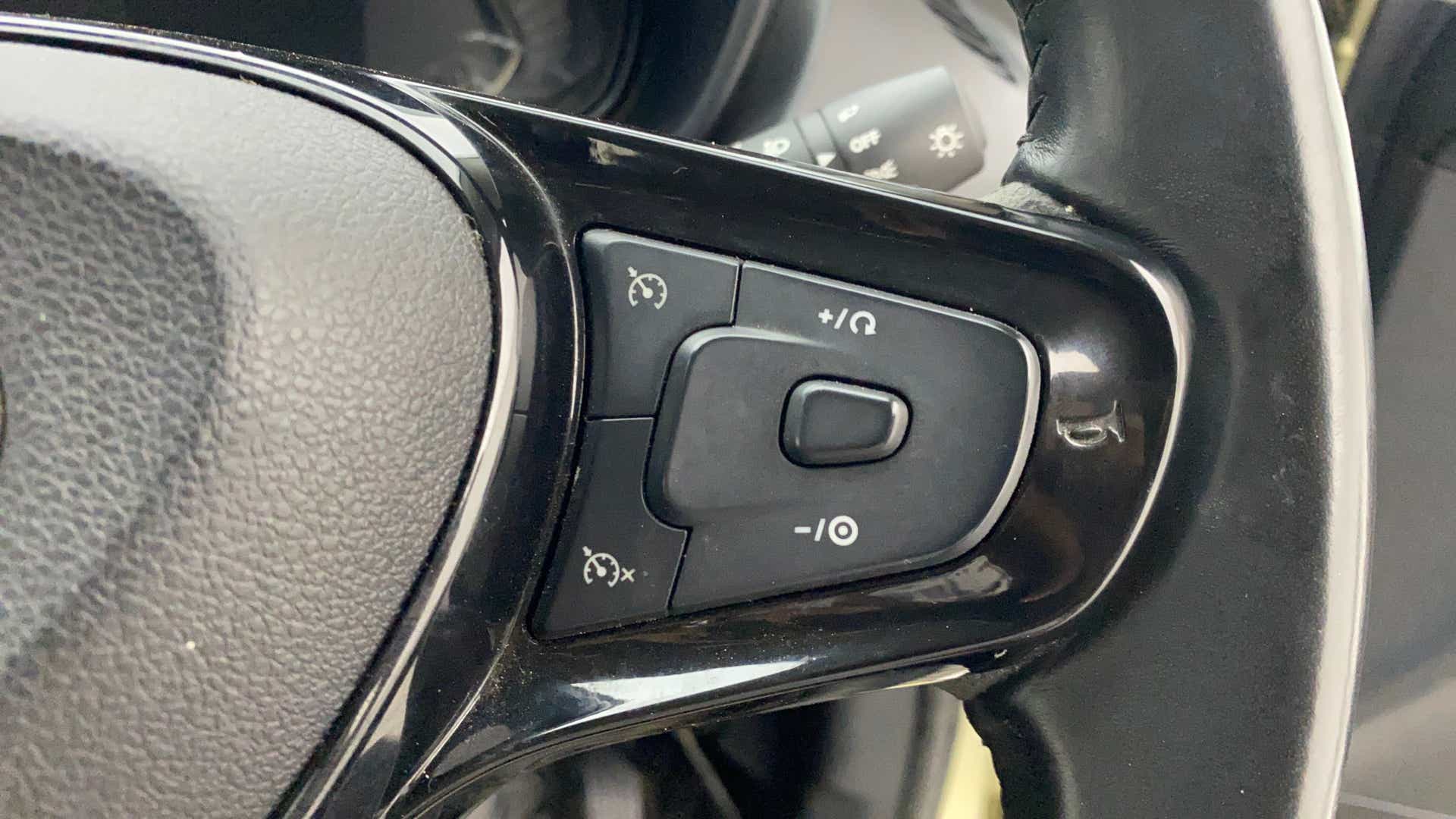 Steering wheel cruise control buttons of a Tata Nexon 2017-2023