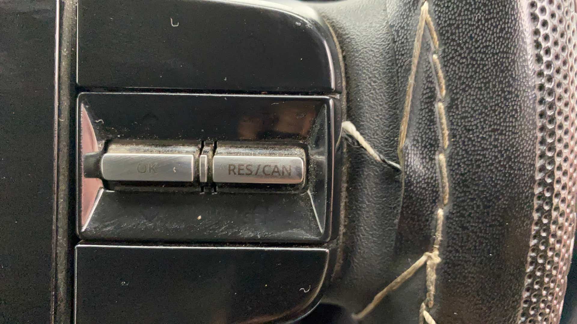 Steering wheel cruise control buttons of a Tata Nexon 2017-2023