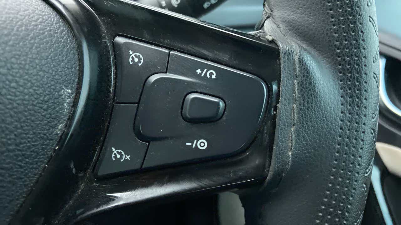 Steering wheel cruise control buttons of a Tata Nexon 2017-2023
