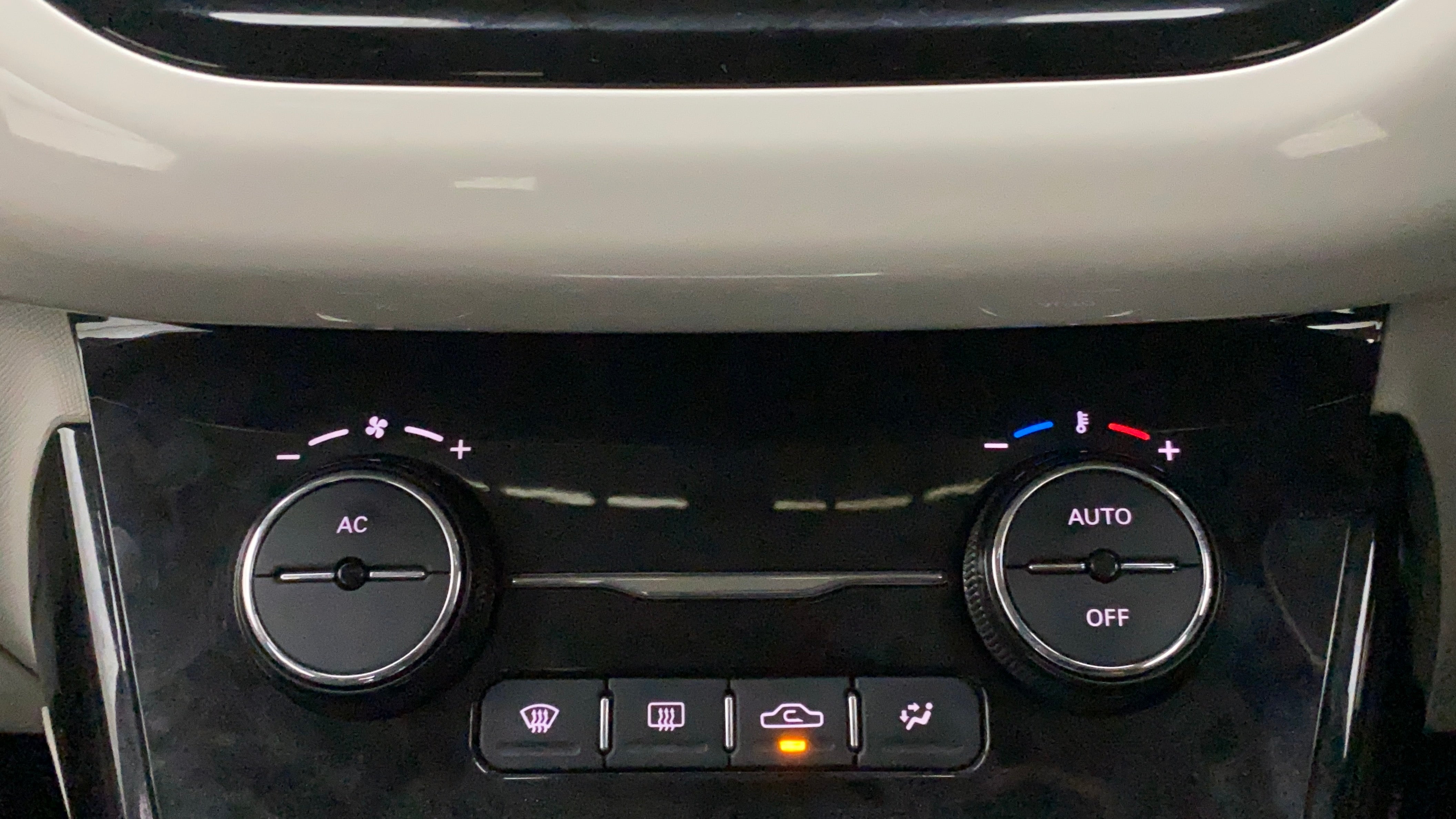Climate control buttons of a Tata Nexon 2017-2023