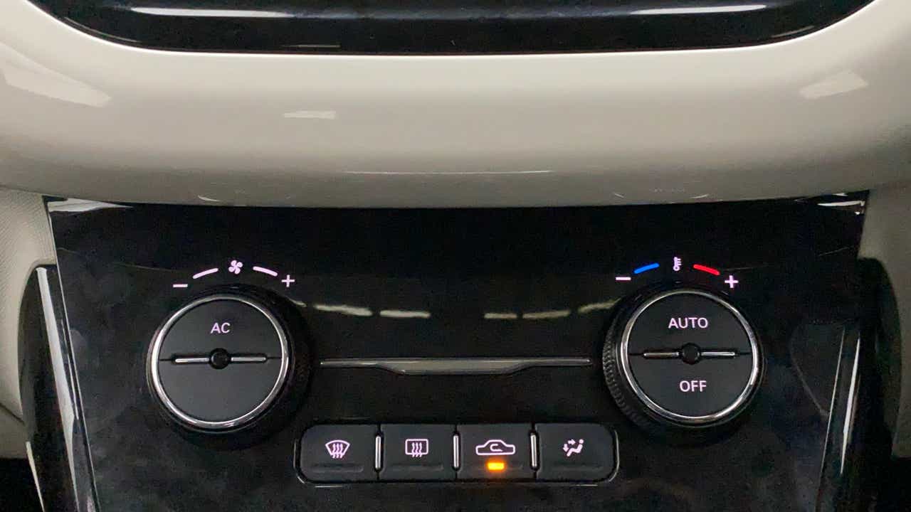 Climate control buttons of a Tata Nexon 2017-2023