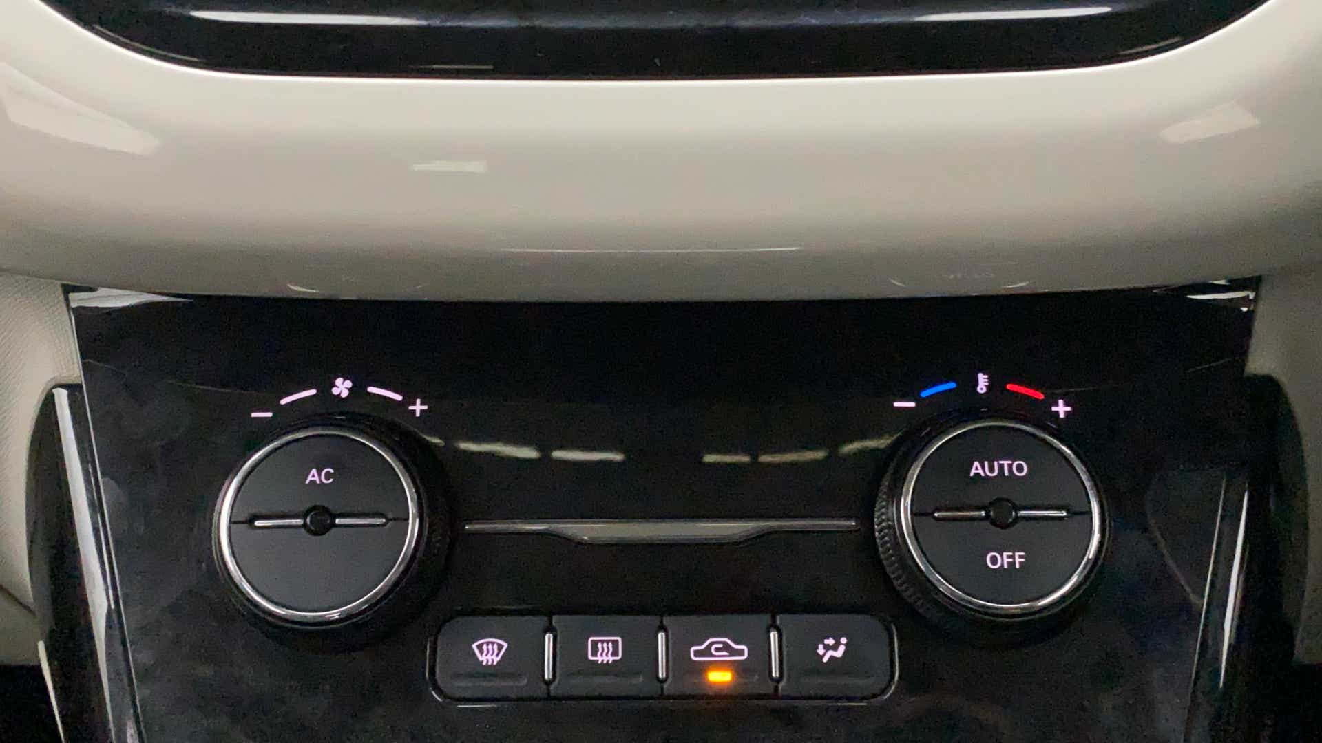 Climate control buttons of a Tata Nexon 2017-2023
