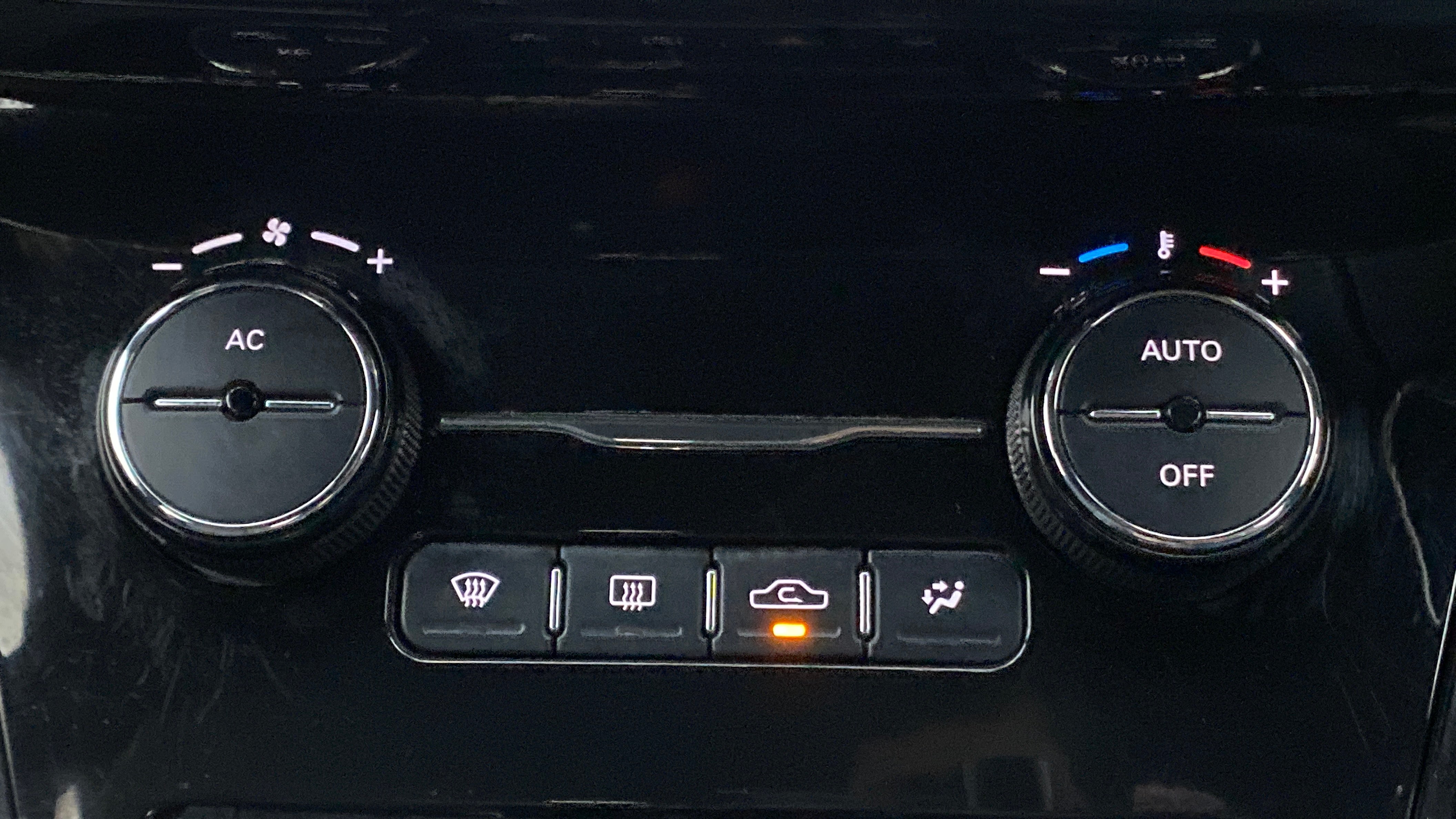 Climate control panel of a Tata Nexon 2017-2023