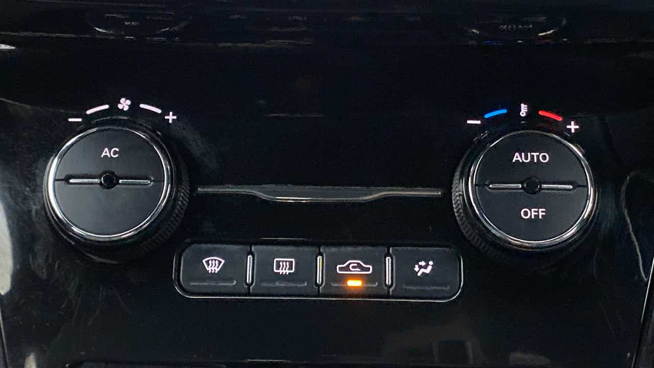 Climate control panel of a Tata Nexon 2017-2023