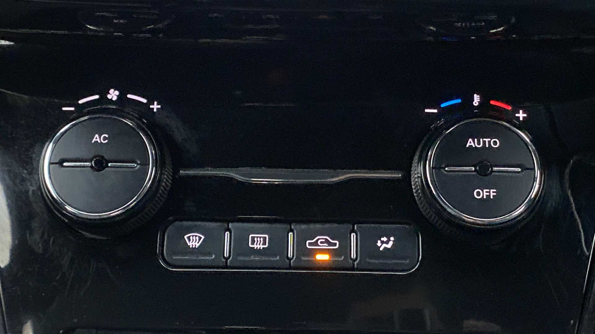 Climate control panel of a Tata Nexon 2017-2023