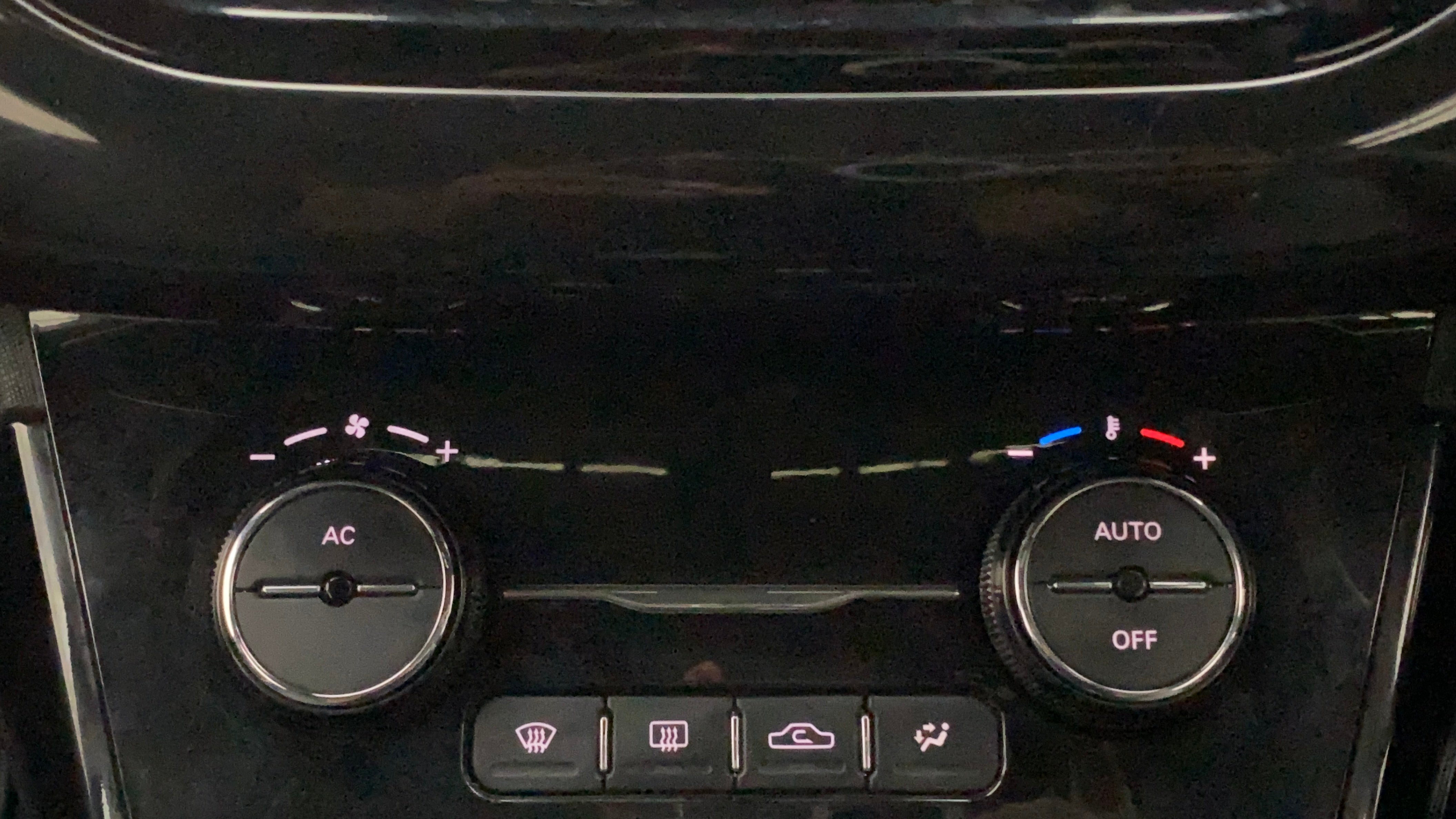 Climate control panel of a Tata Nexon 2017-2023