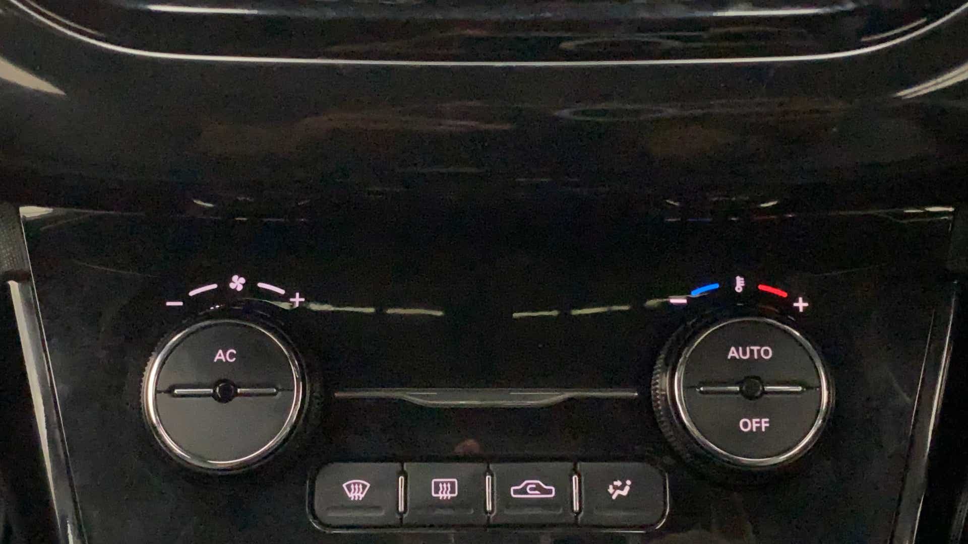 Climate control panel of a Tata Nexon 2017-2023