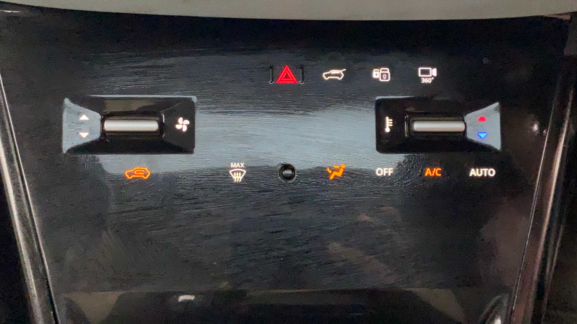 Climate control panel of a Tata Nexon 2017-2023