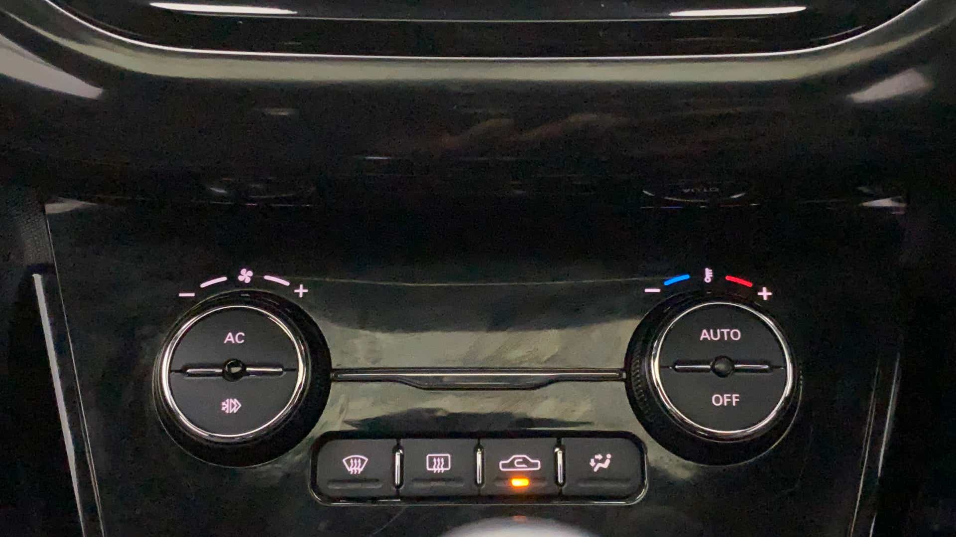 Interior dashboard climate controls of a Tata Nexon 2017-2023