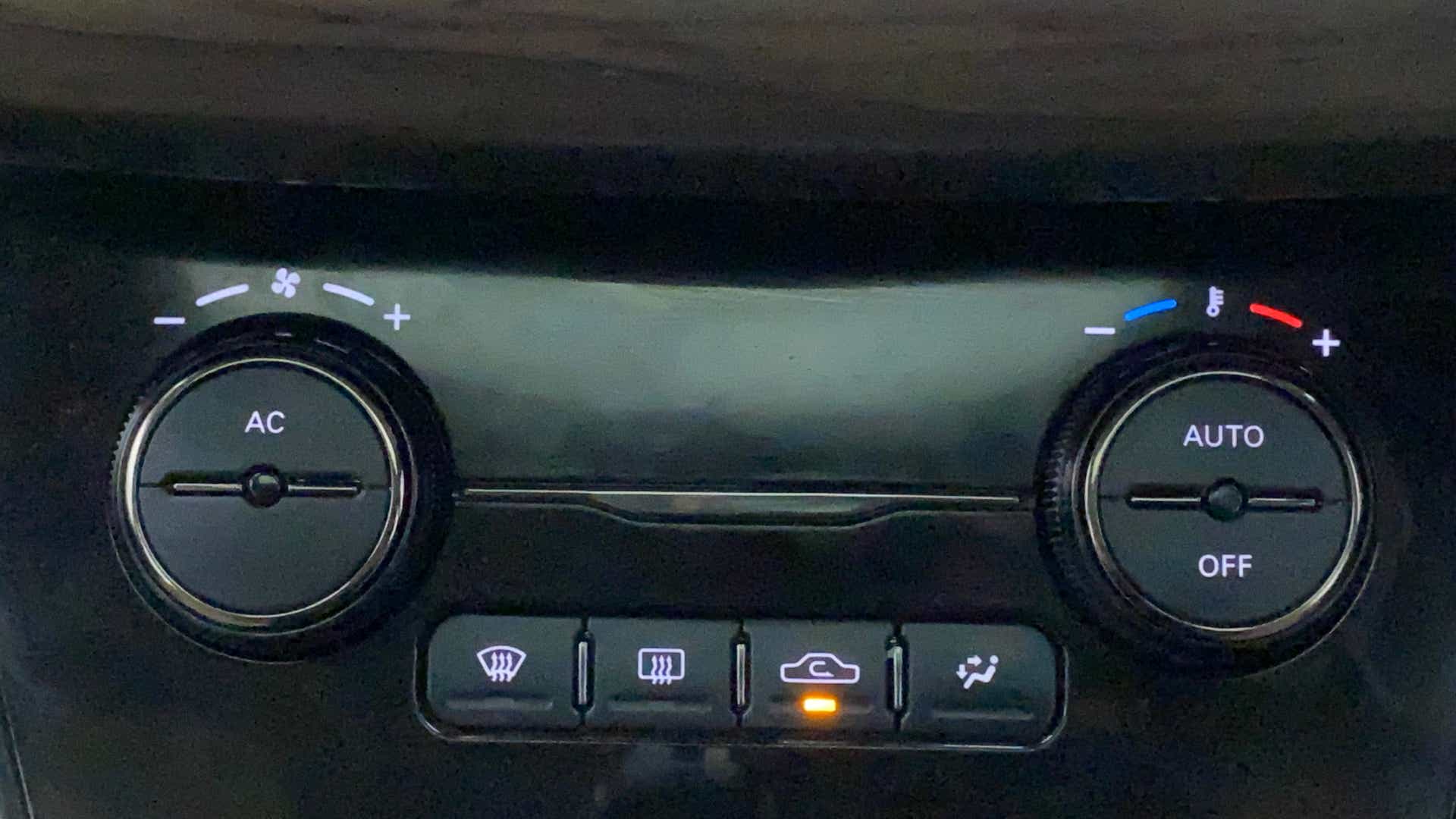 Climate control panel of a Tata Nexon 2017-2023