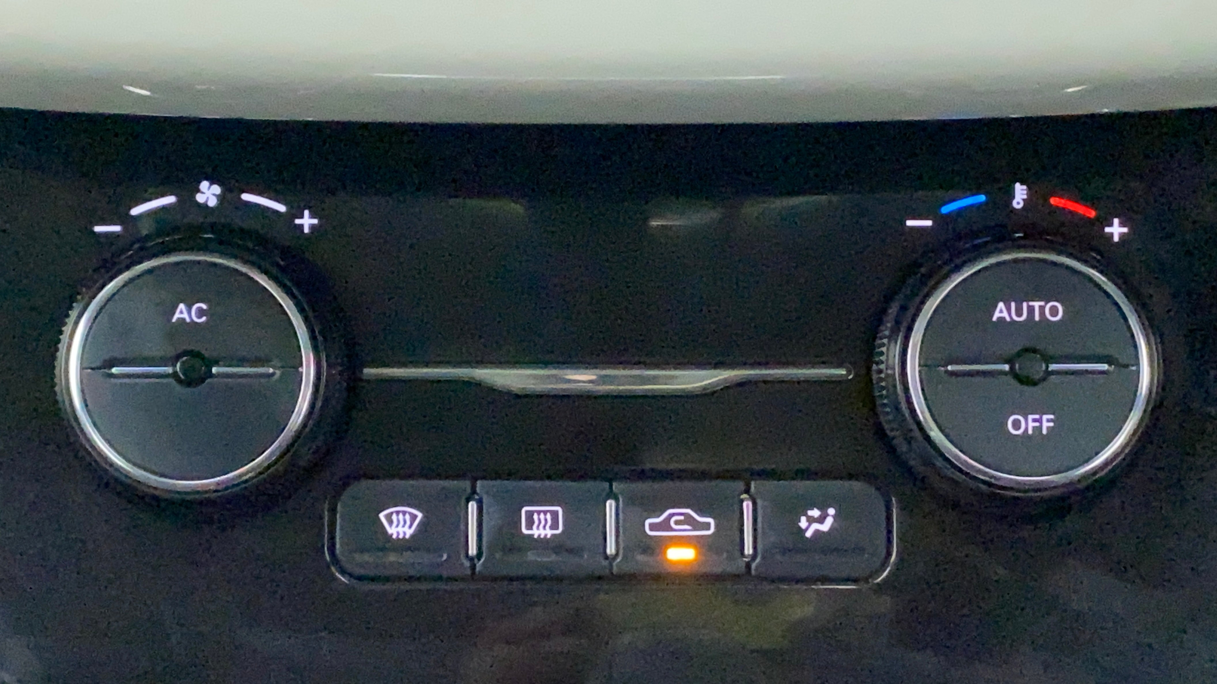 Close-up of the climate control panel of a Tata Nexon 2017-2023