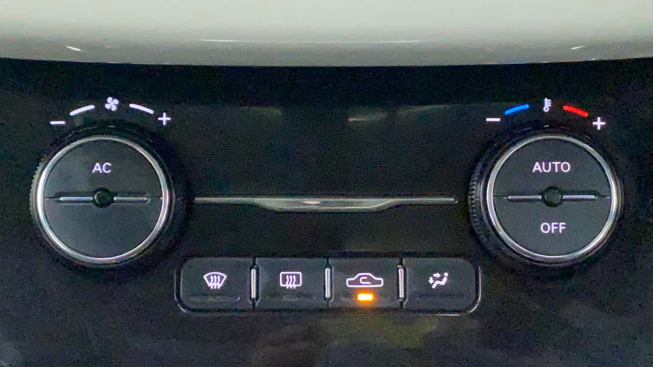 Close-up of the climate control panel of a Tata Nexon 2017-2023
