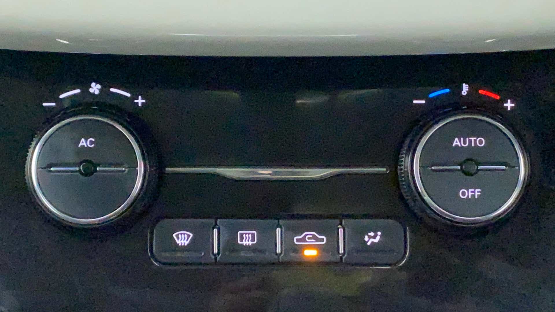 Close-up of the climate control panel of a Tata Nexon 2017-2023